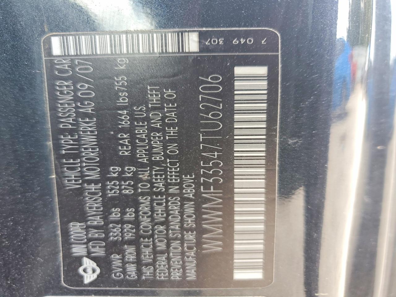 2007 Mini Cooper Black vin: WMWMF33547TU62706