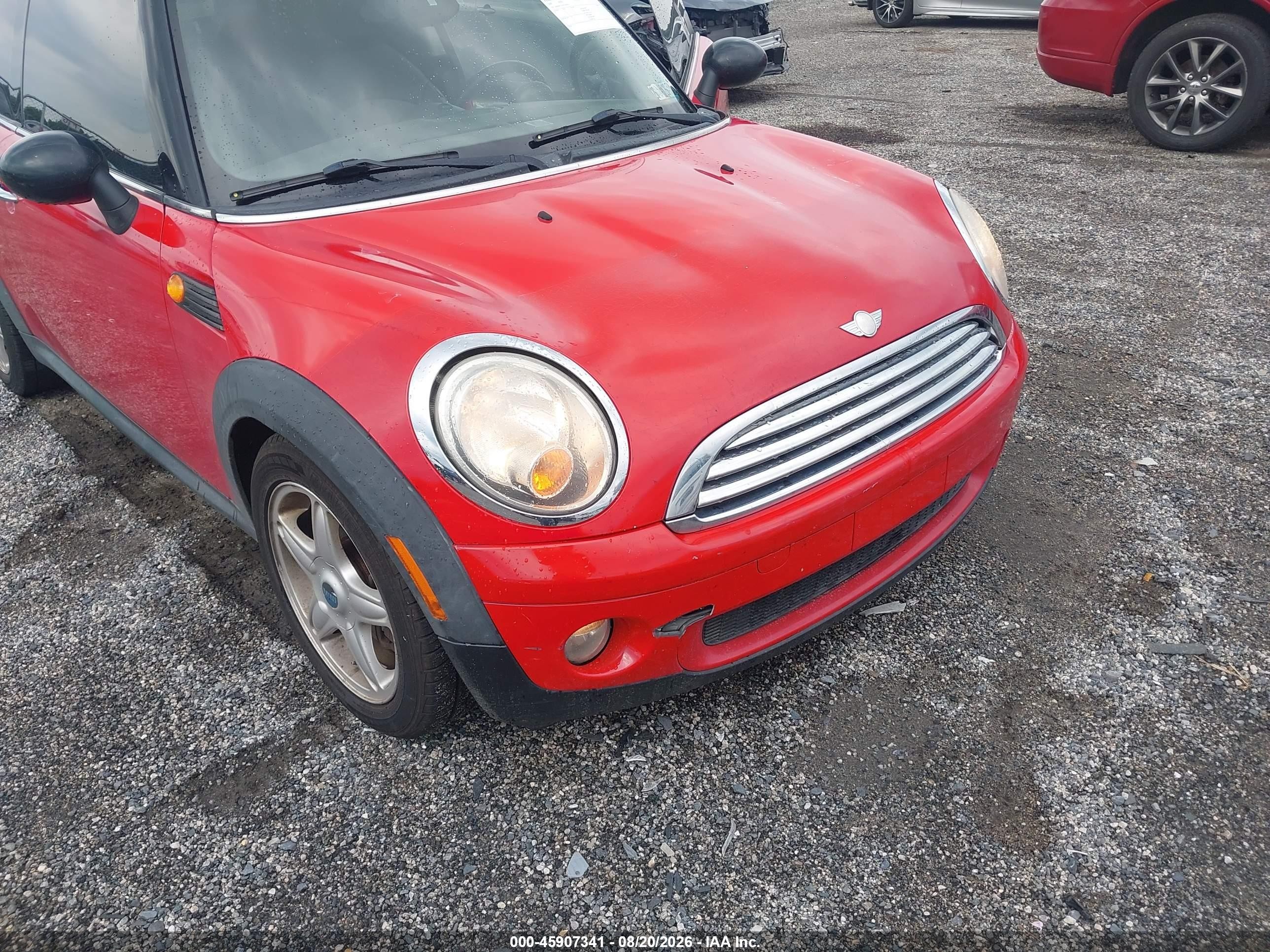 2009 Mini Cooper   Red vin: WMWMF33549TT69056