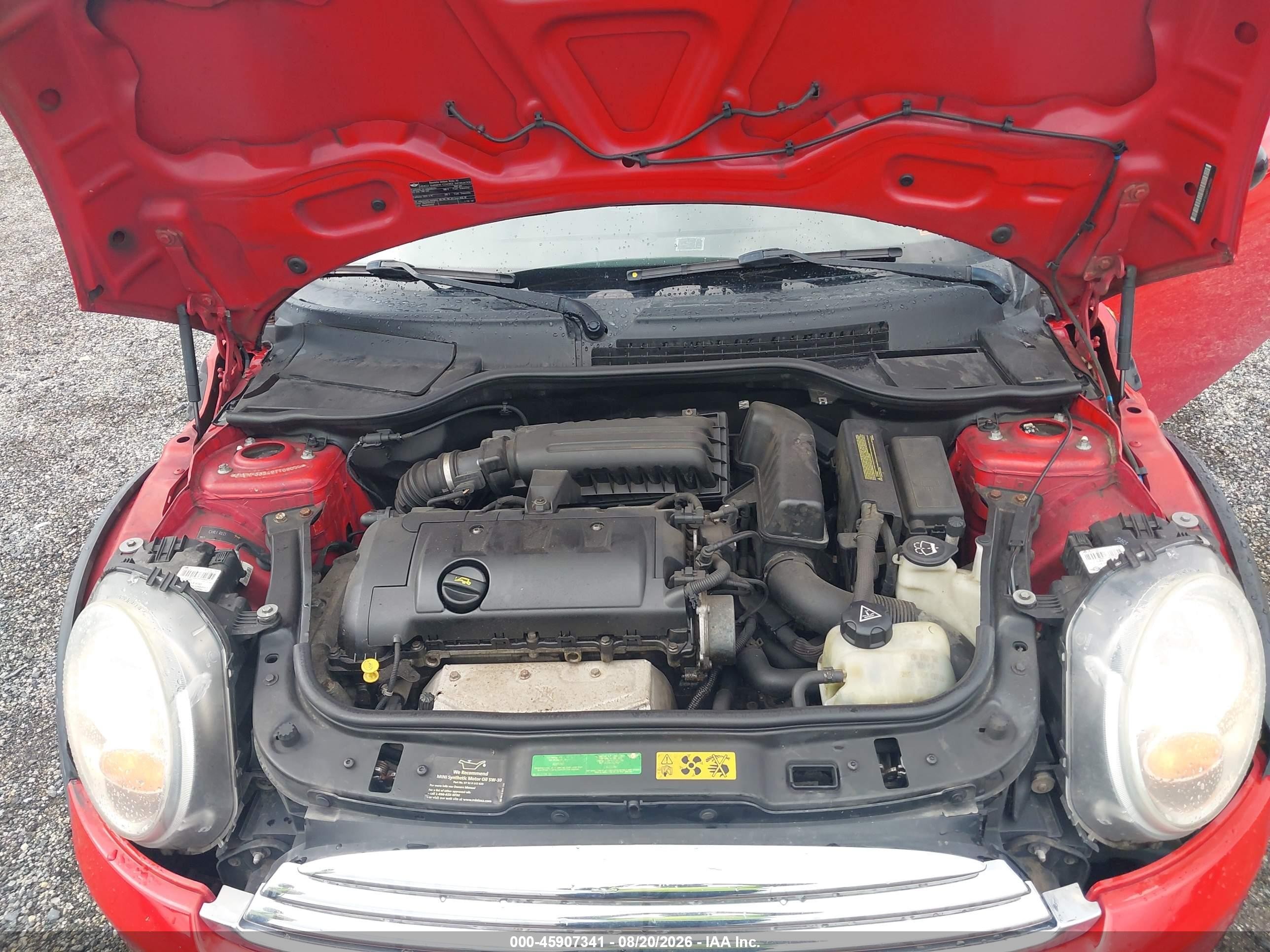 2009 Mini Cooper   Red vin: WMWMF33549TT69056