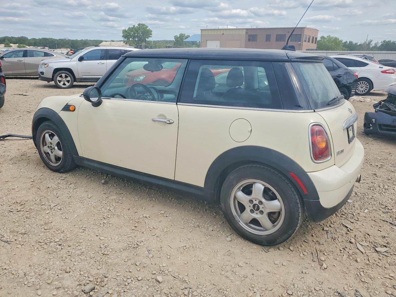 2009 Mini Cooper Tan vin: WMWMF33549TW74251