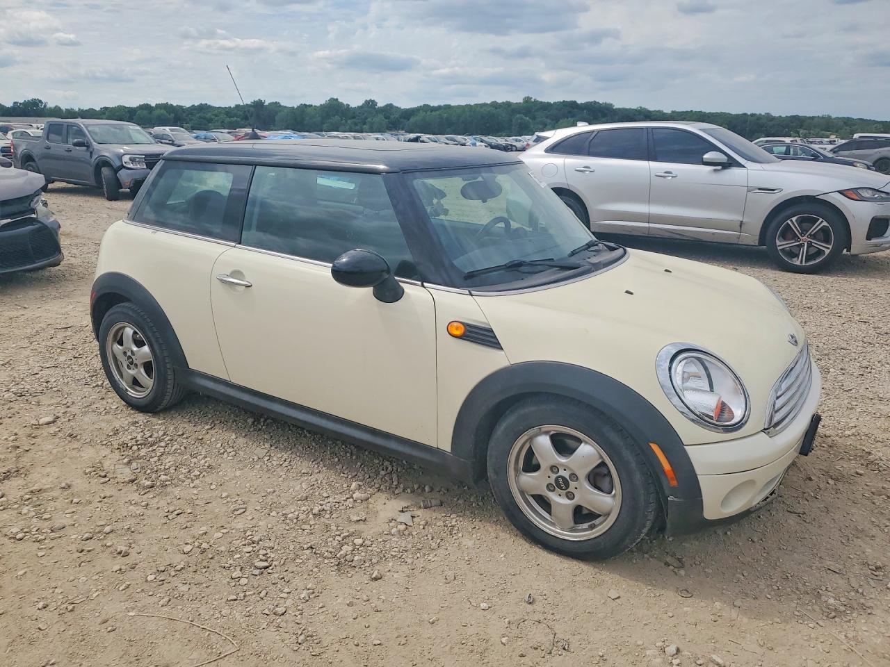 2009 Mini Cooper Tan vin: WMWMF33549TW74251