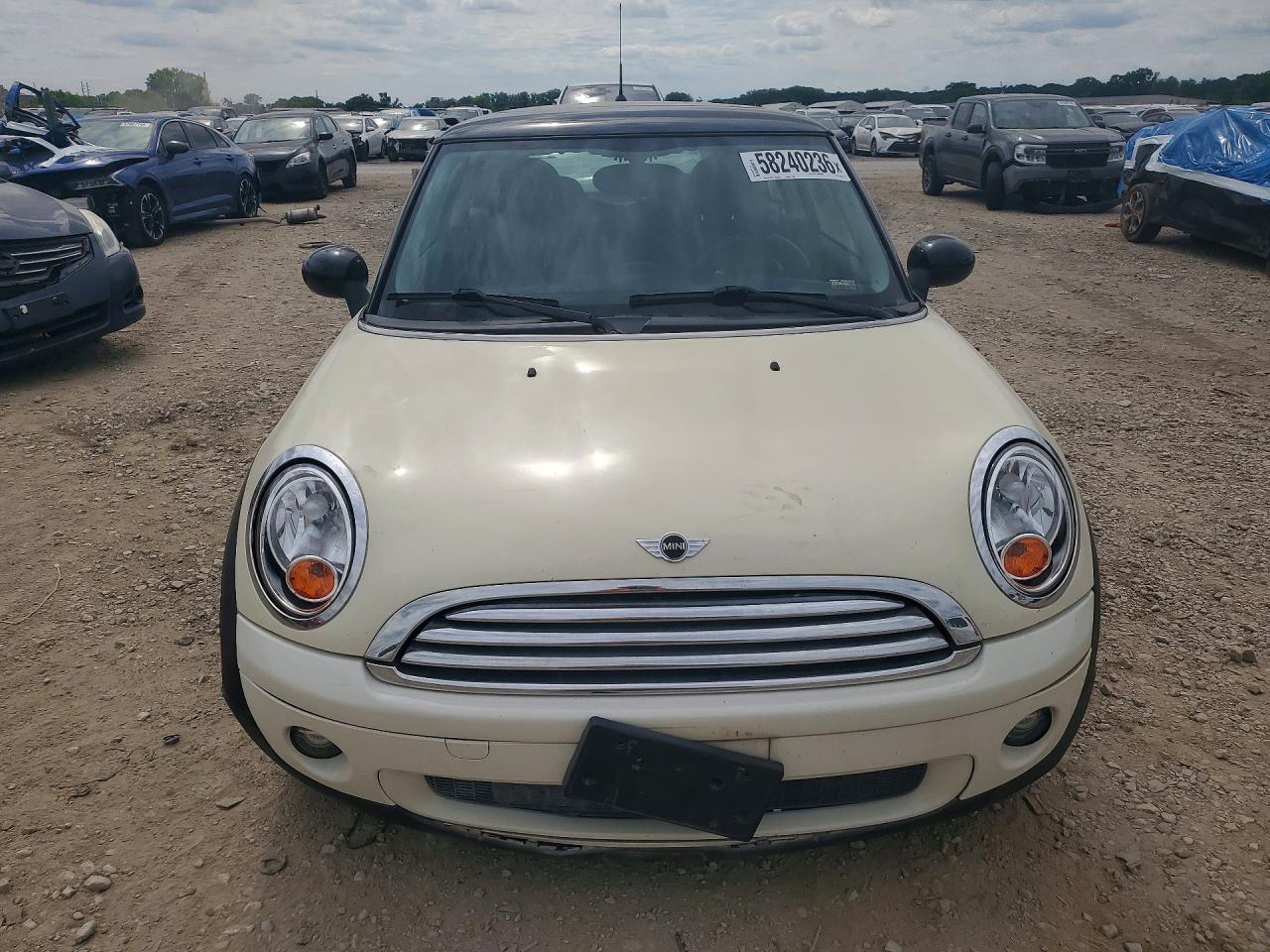 2009 Mini Cooper Tan vin: WMWMF33549TW74251