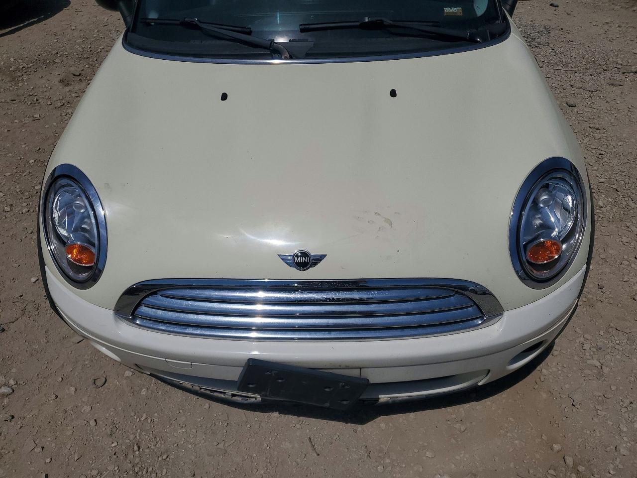 2009 Mini Cooper Tan vin: WMWMF33549TW74251