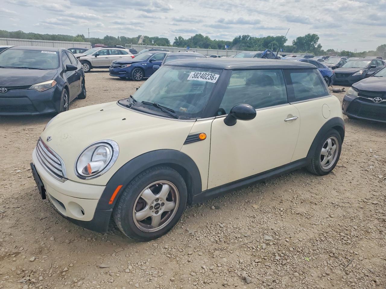 2009 Mini Cooper Tan vin: WMWMF33549TW74251