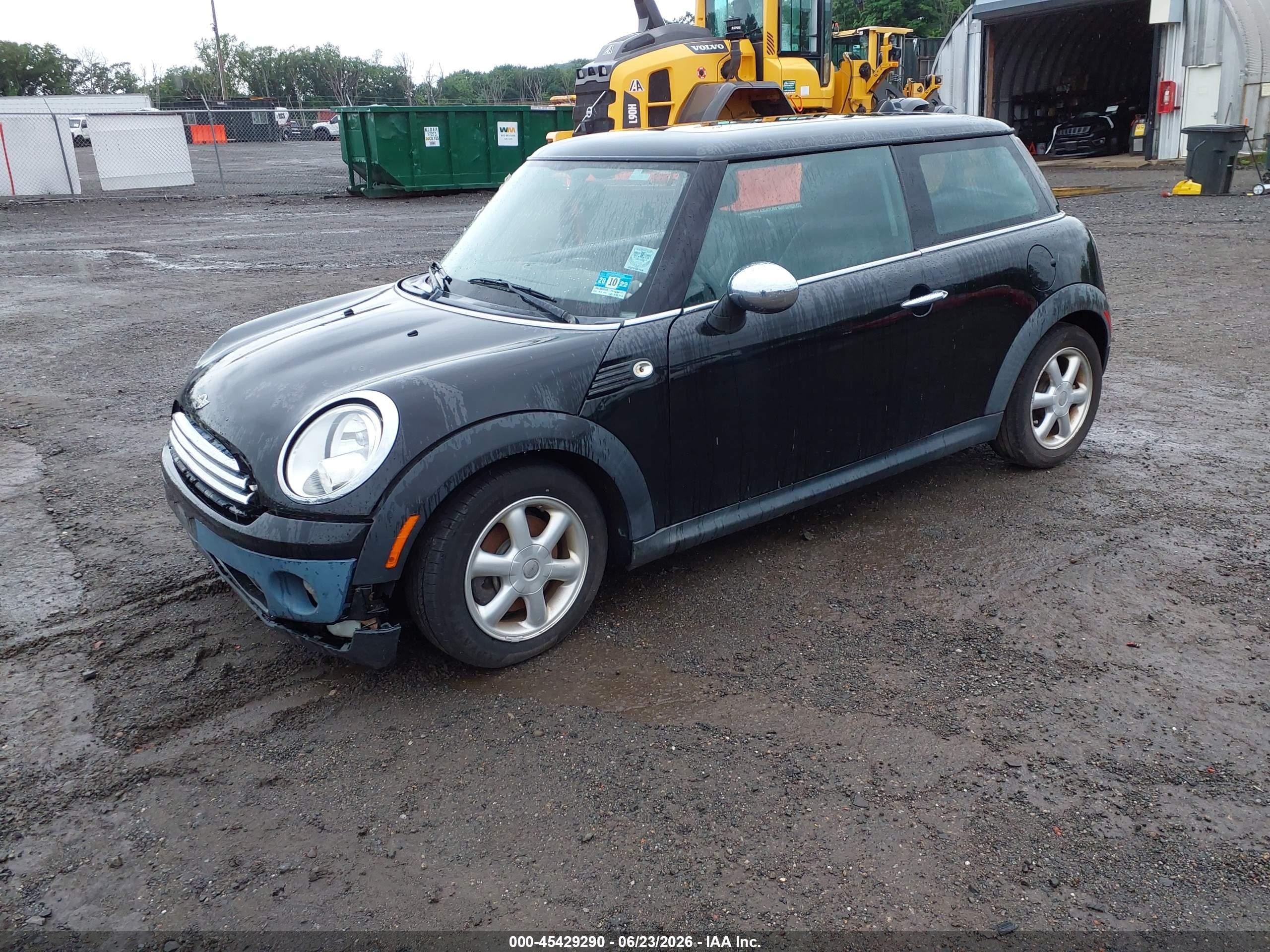 2009 Mini Cooper   Black vin: WMWMF33559TW73979
