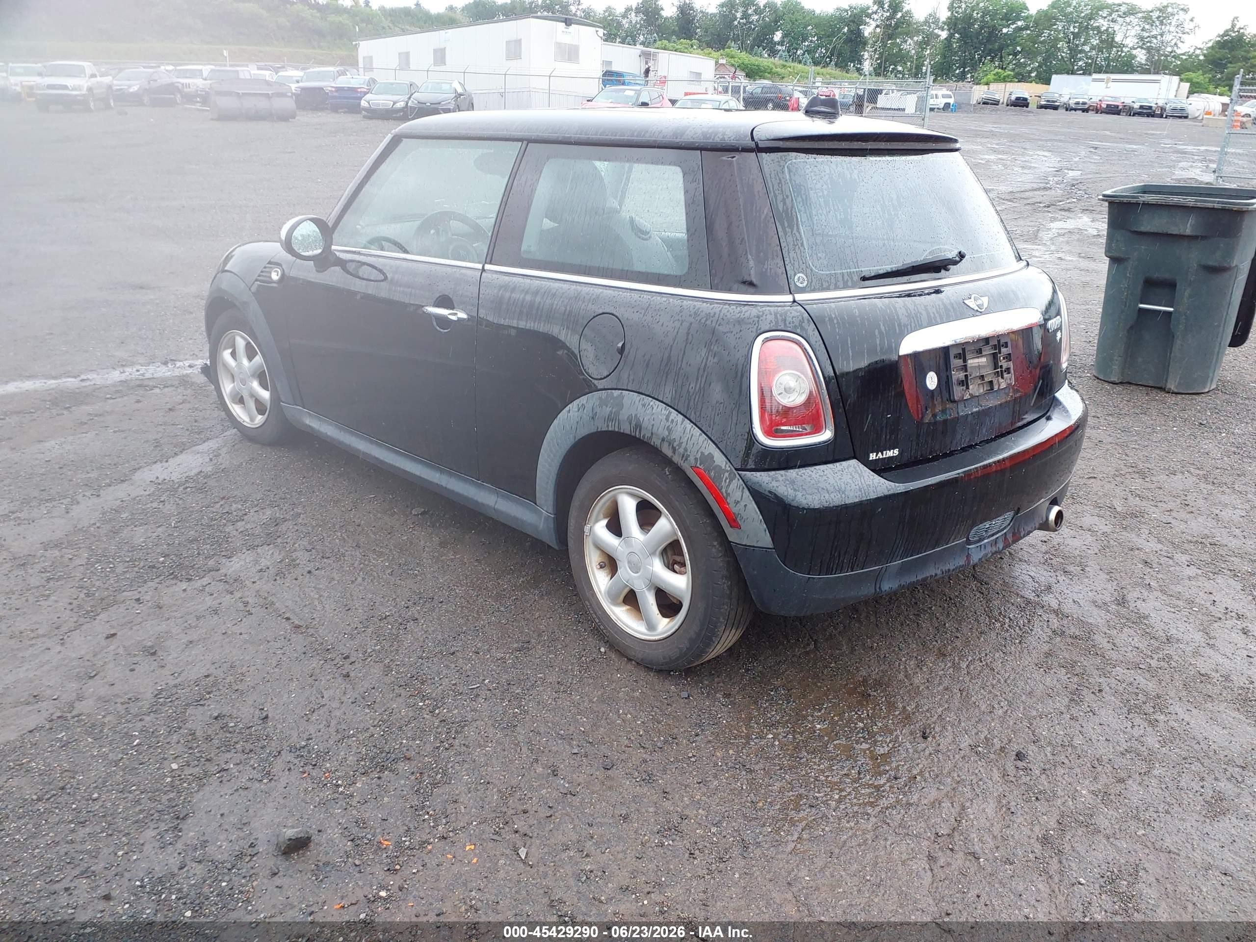 2009 Mini Cooper   Black vin: WMWMF33559TW73979