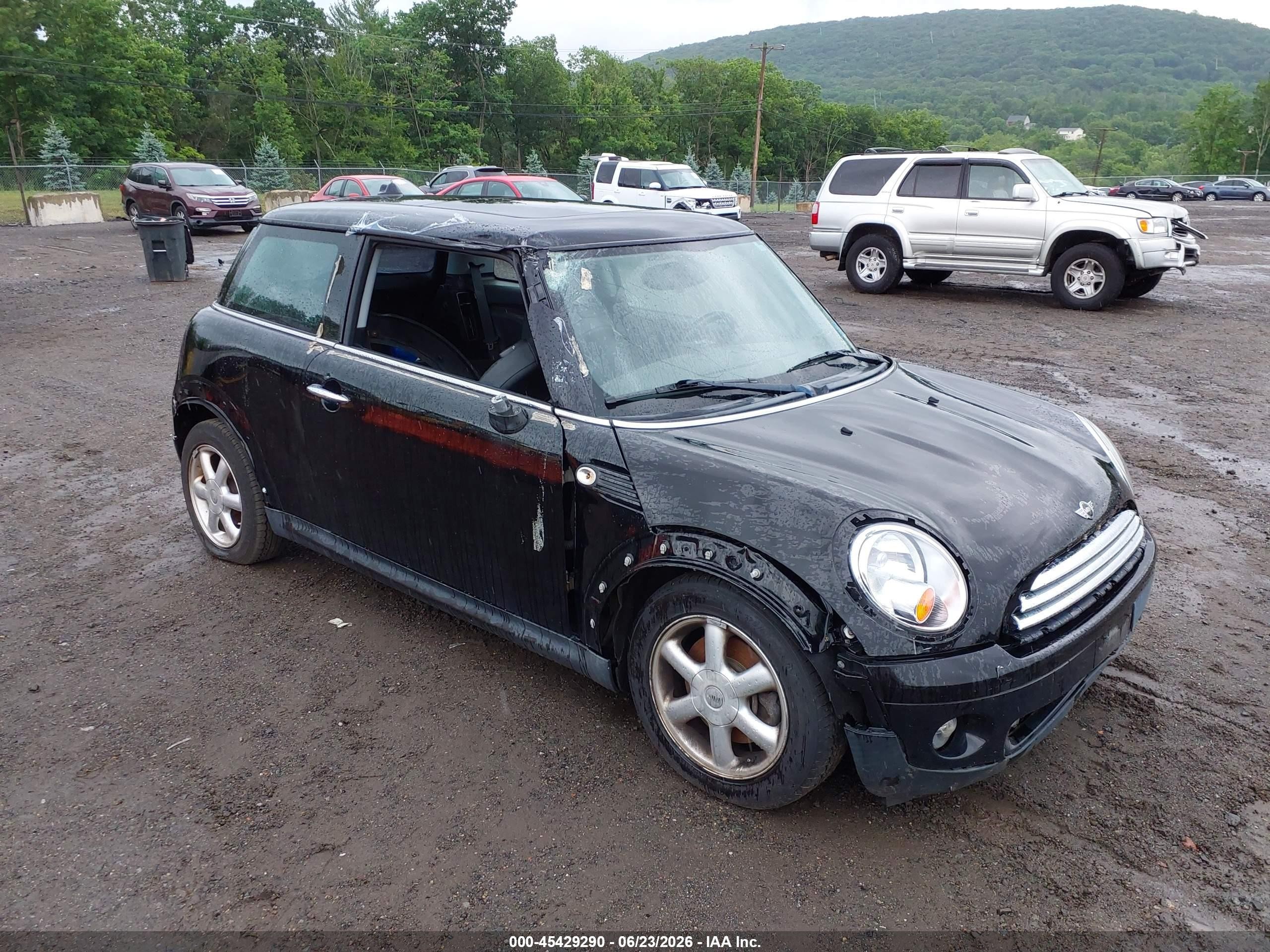 2009 Mini Cooper   Black vin: WMWMF33559TW73979