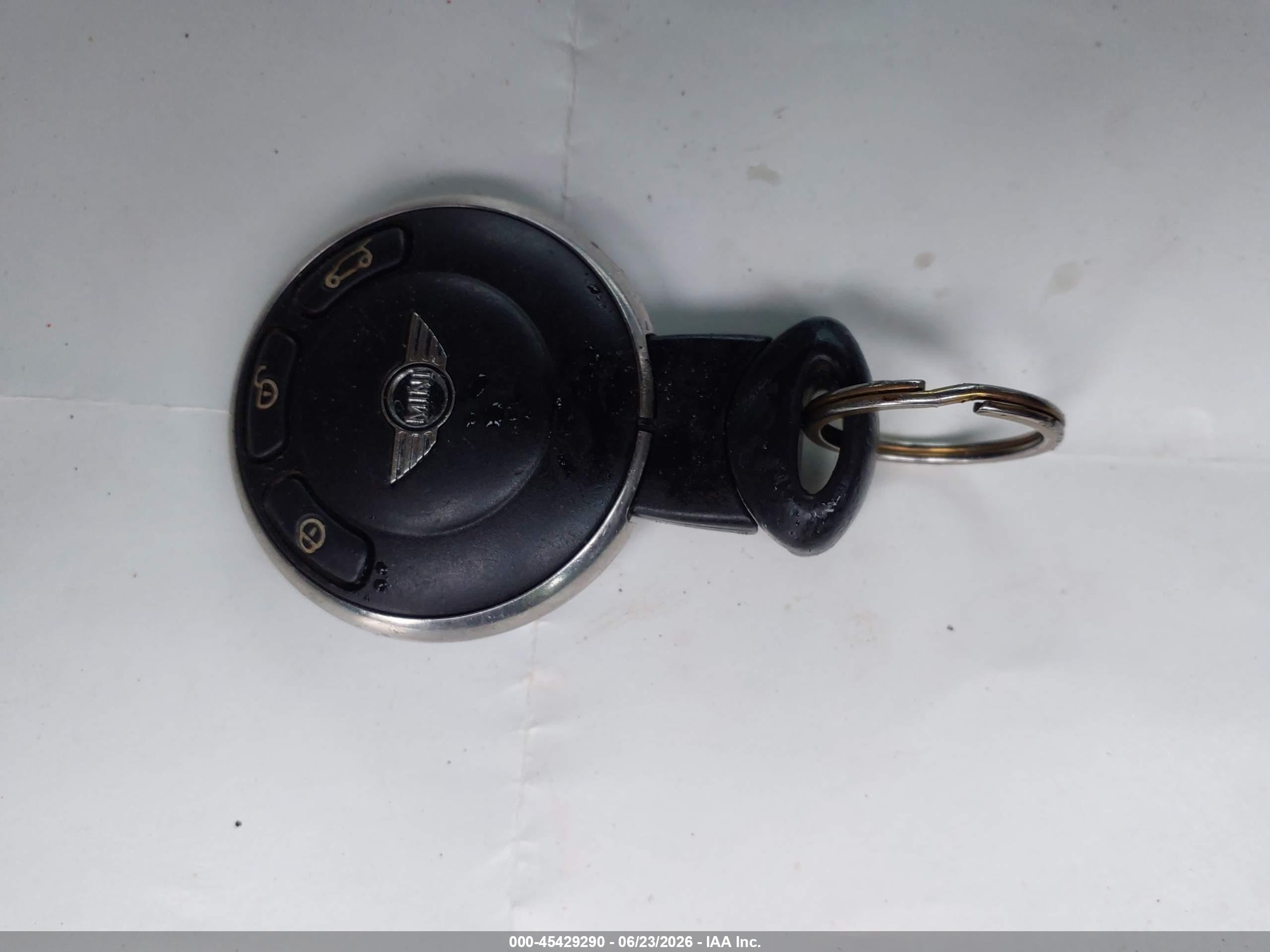 2009 Mini Cooper   Black vin: WMWMF33559TW73979