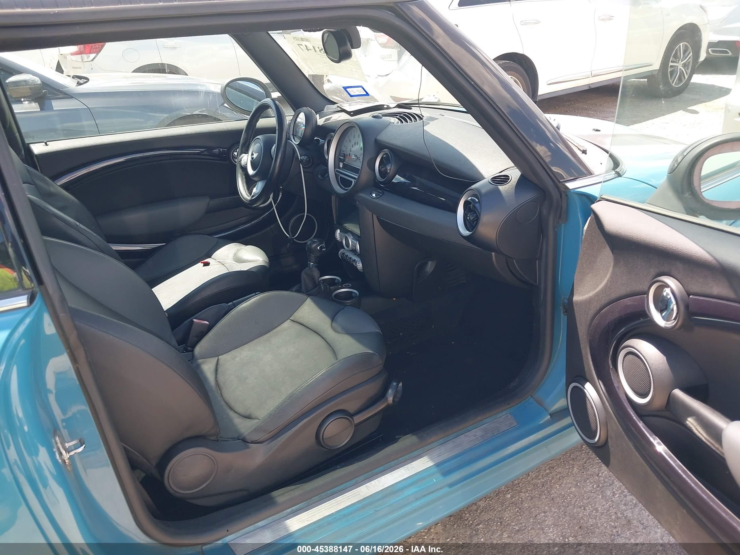 2009 Mini Cooper   Light Blue vin: WMWMF33579TW76575