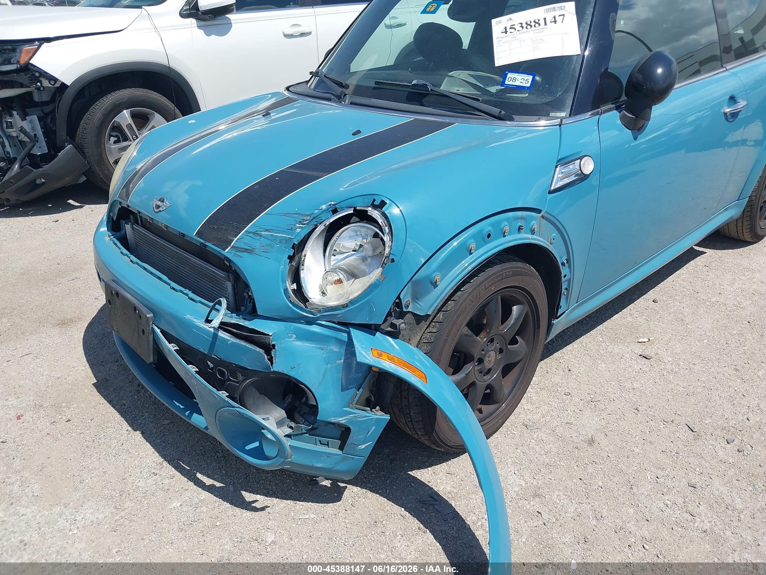 2009 Mini Cooper   Light Blue vin: WMWMF33579TW76575