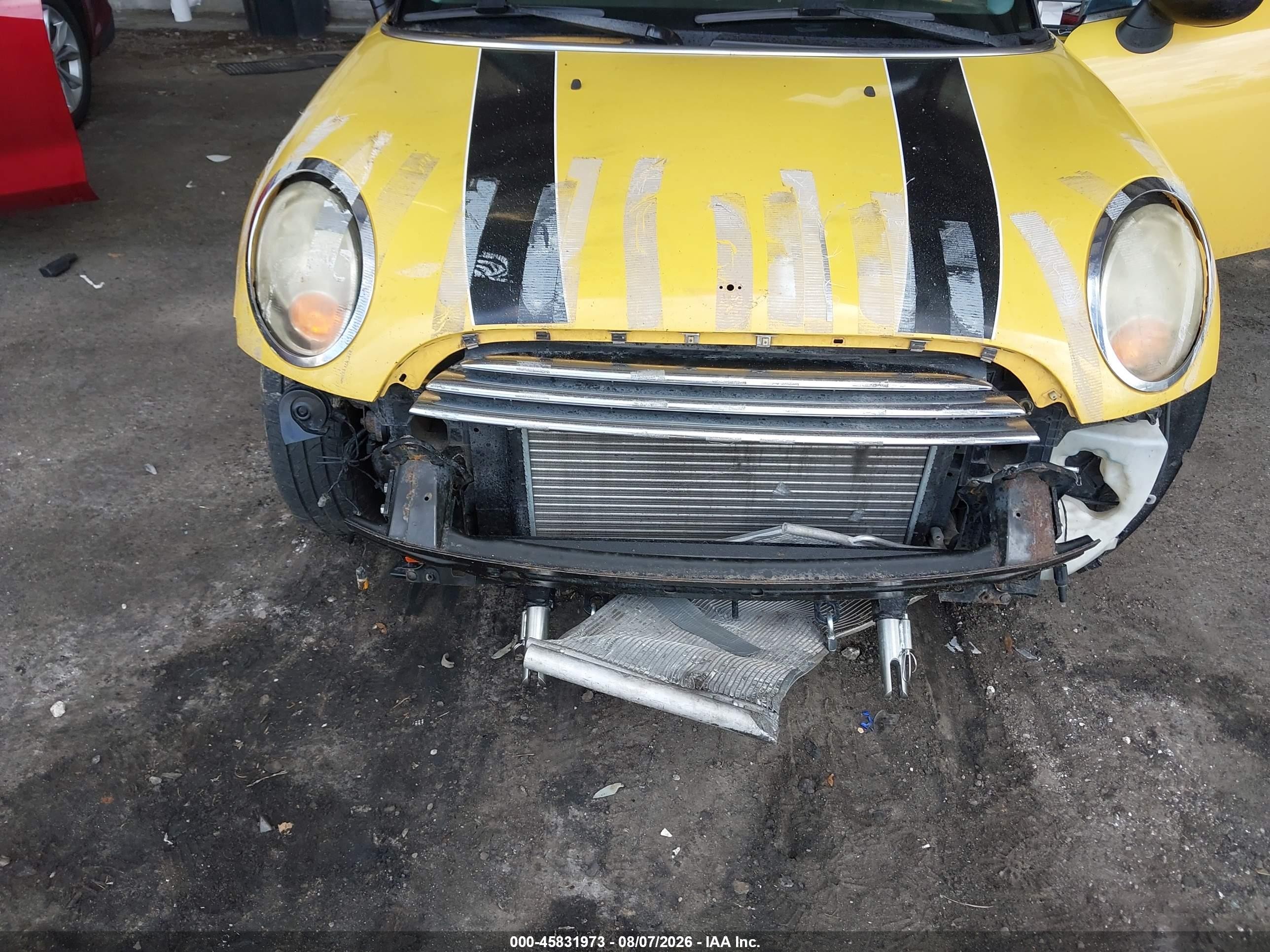 2009 Mini Cooper   Желтый vin: WMWMF33589TU76031