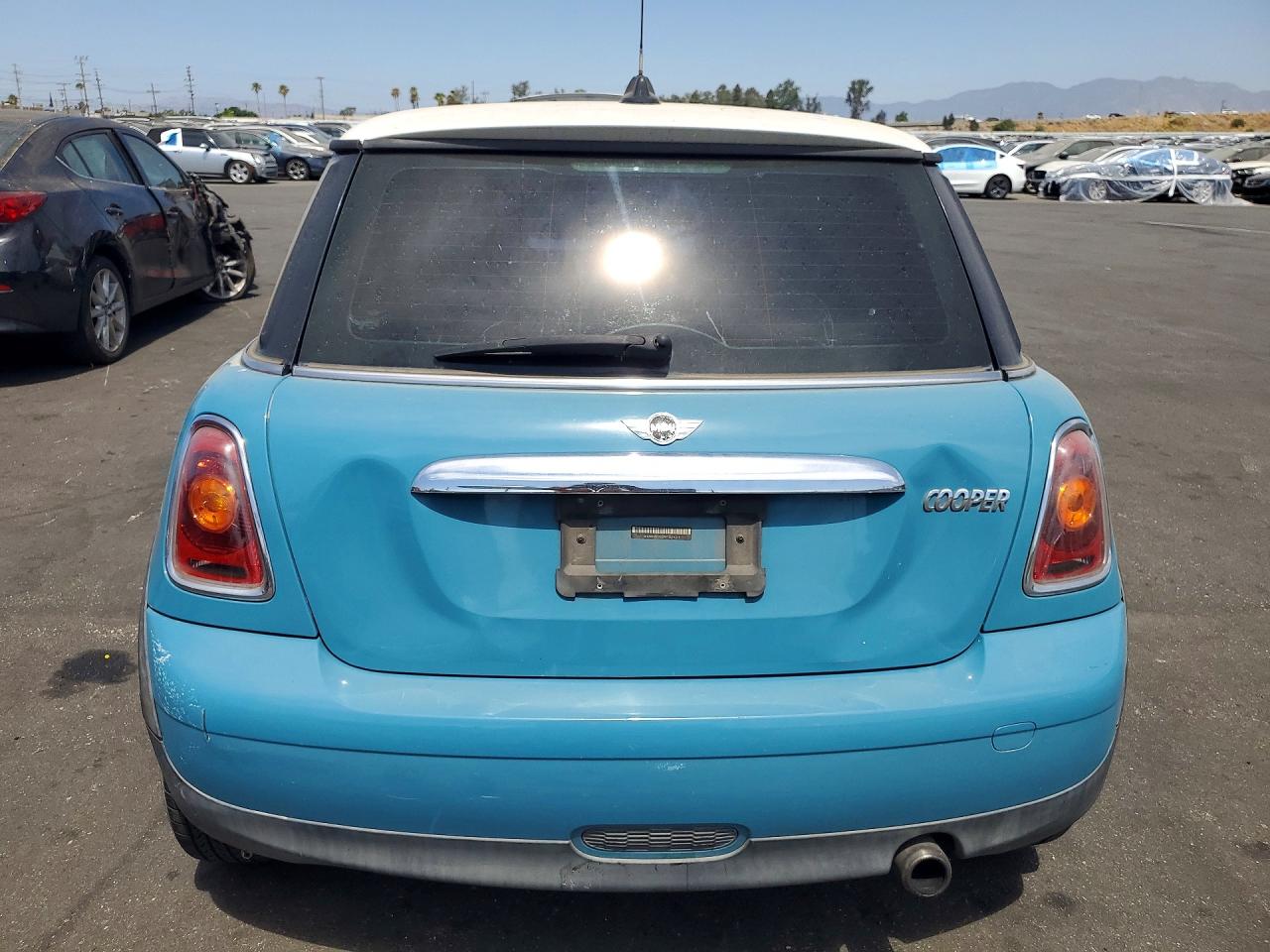2009 Mini Cooper Синий vin: WMWMF33599TW76271