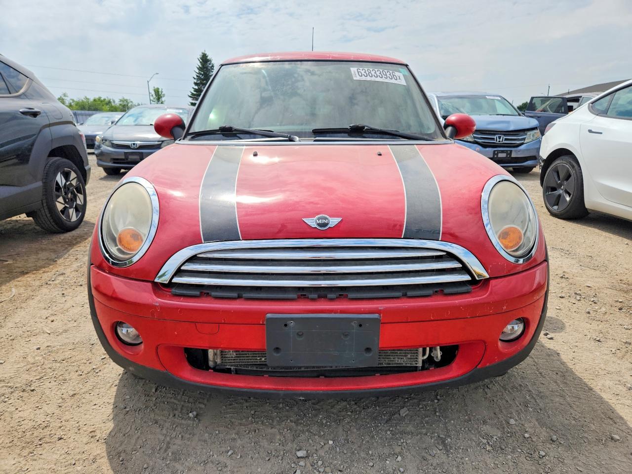 2009 Mini Cooper Red vin: WMWMF33599TZ21134