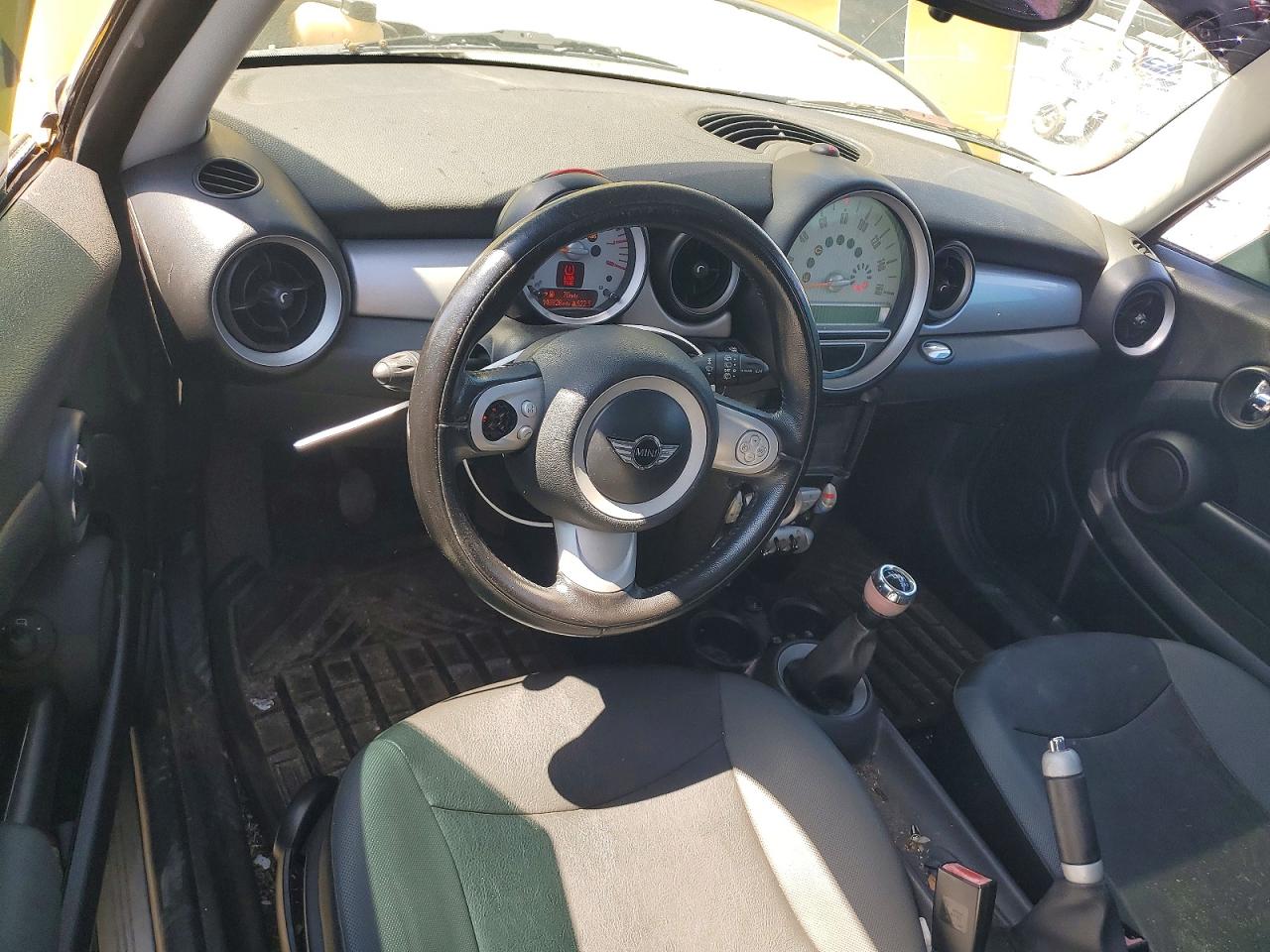 2009 Mini Cooper Yellow vin: WMWMF335X9TU71557