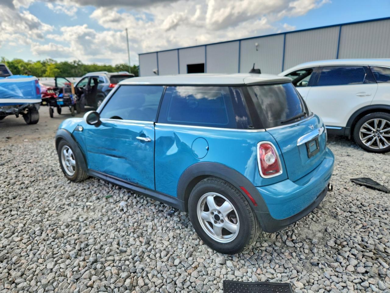 2010 Mini Cooper Turquoise vin: WMWMF3C50ATZ25044