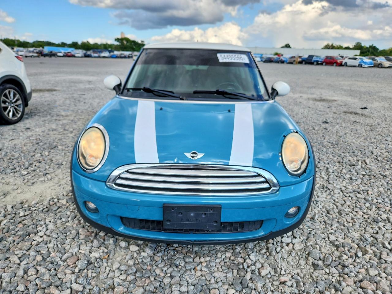 2010 Mini Cooper Turquoise vin: WMWMF3C50ATZ25044