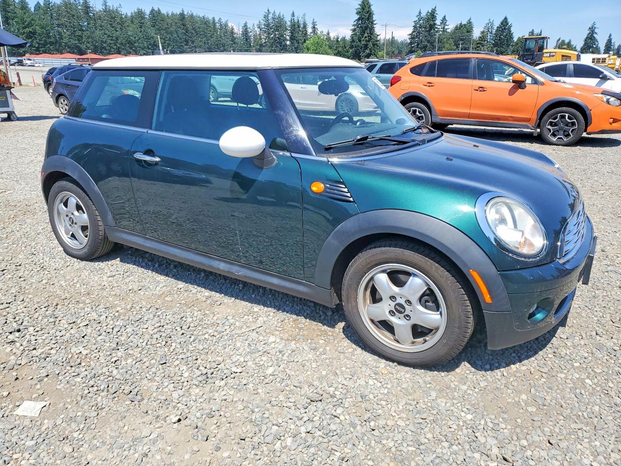 2010 Mini Cooper Green vin: WMWMF3C50ATZ25237