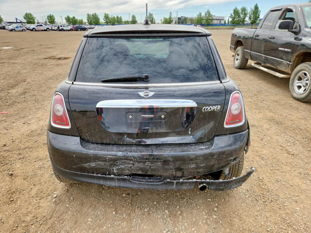 2010 Mini Cooper Черный vin: WMWMF3C51ATU78014