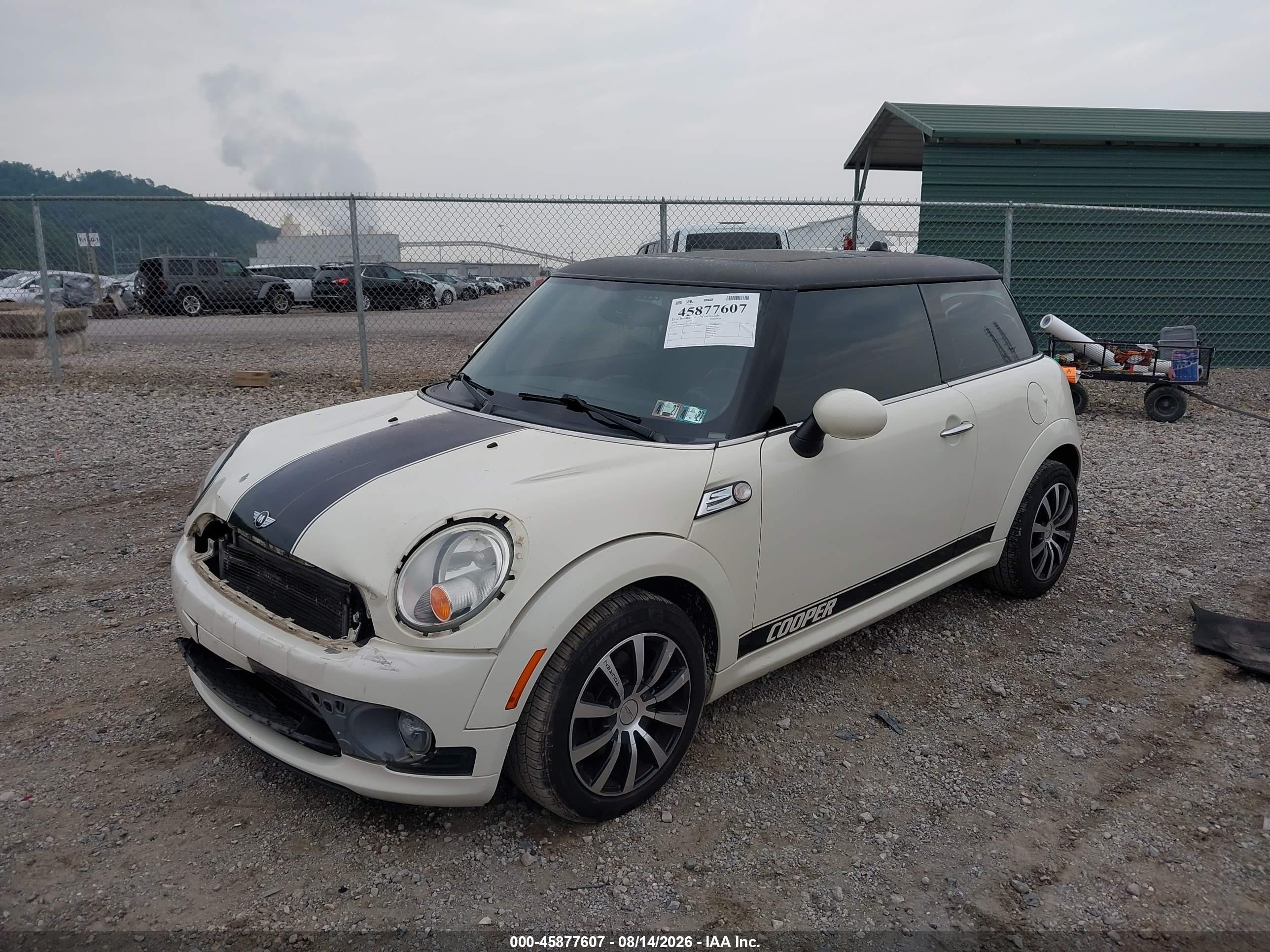 2010 Mini Cooper   Cream vin: WMWMF3C51ATU79504
