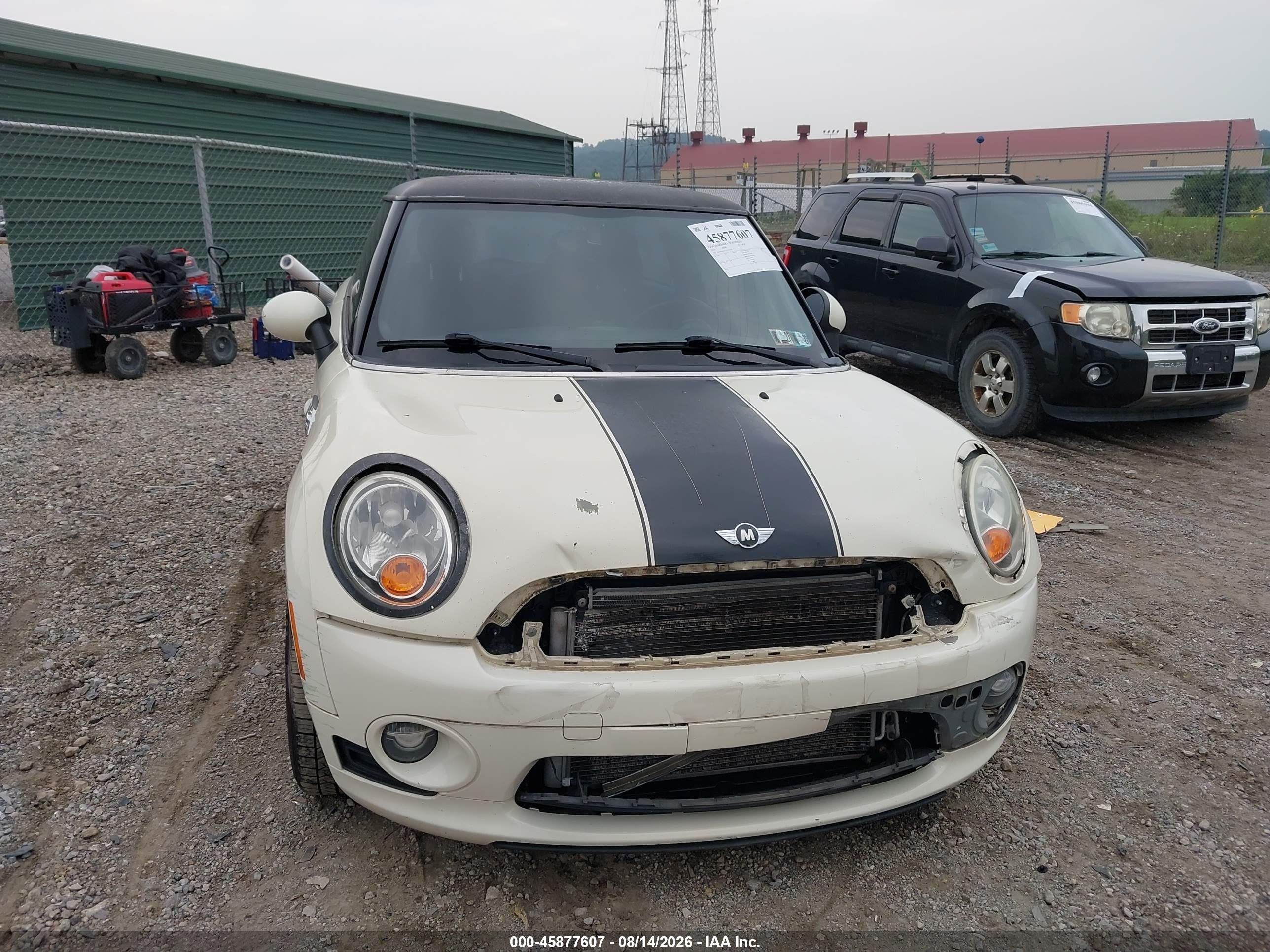 2010 Mini Cooper   Cream vin: WMWMF3C51ATU79504