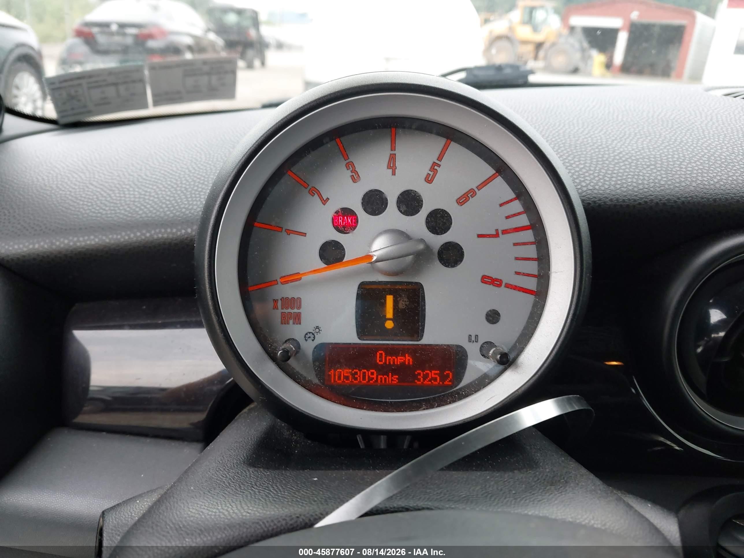 2010 Mini Cooper   Cream vin: WMWMF3C51ATU79504