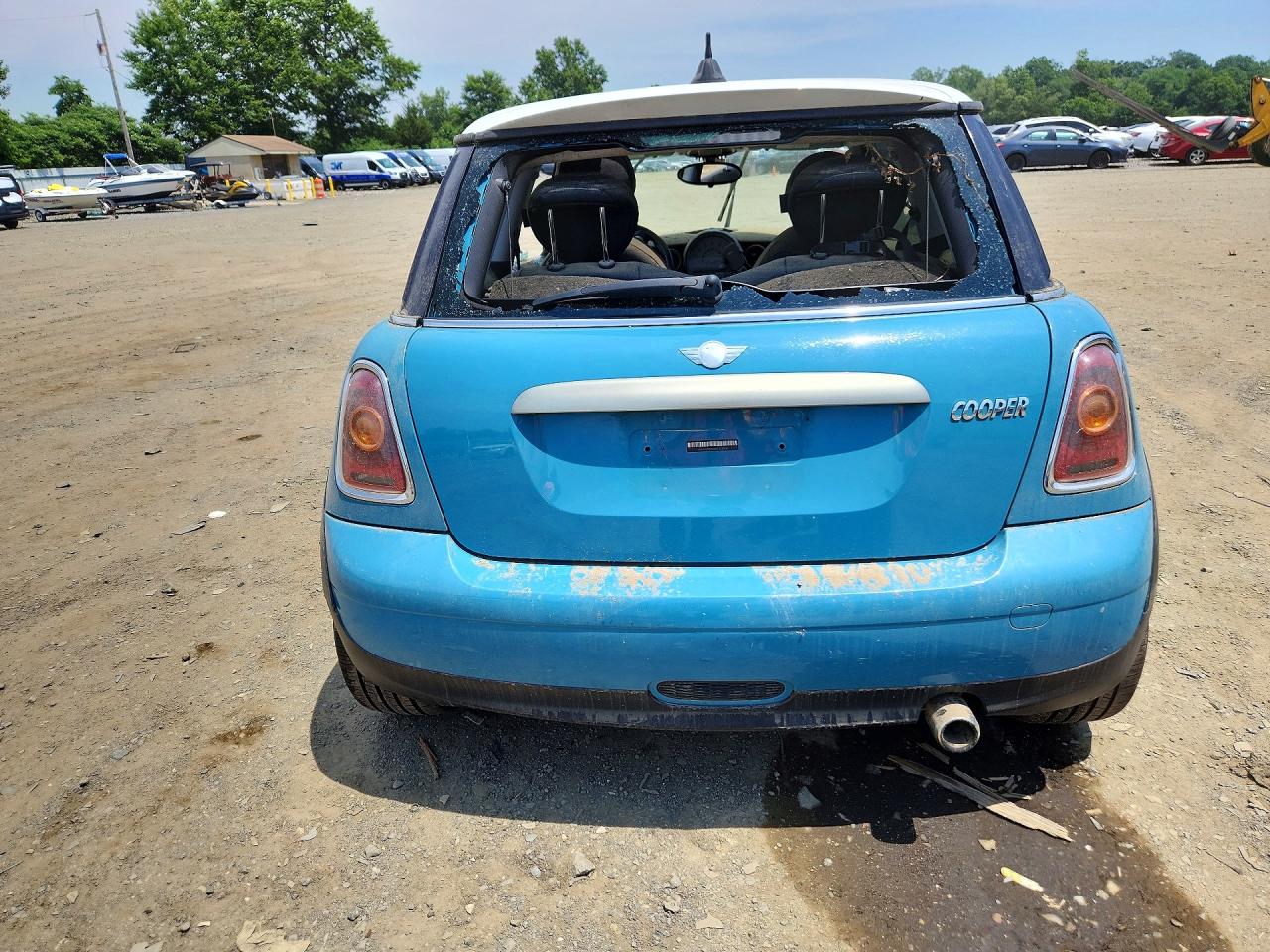 2010 Mini Cooper Blue vin: WMWMF3C51ATZ22704