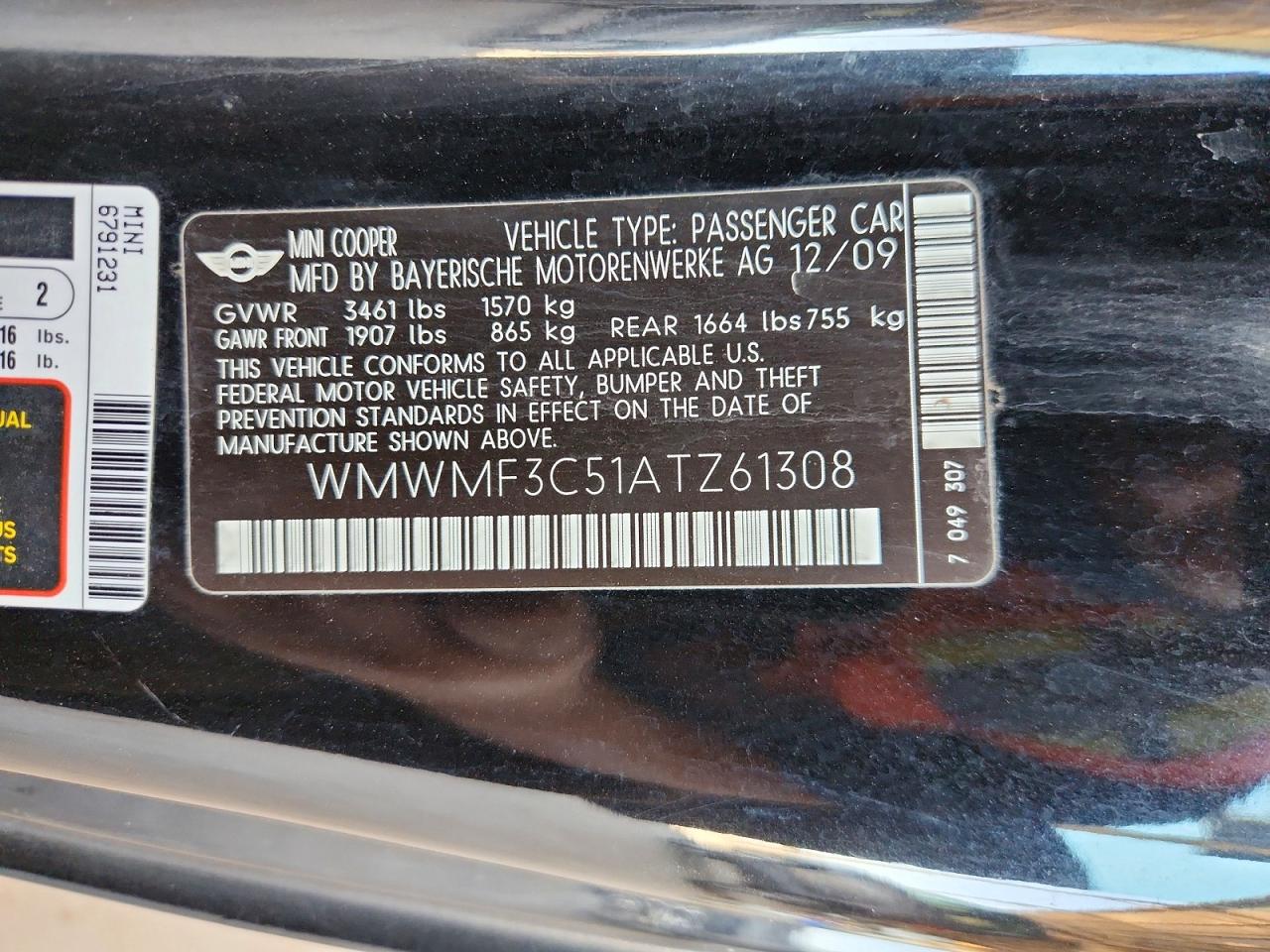 2010 Mini Cooper Black vin: WMWMF3C51ATZ61308