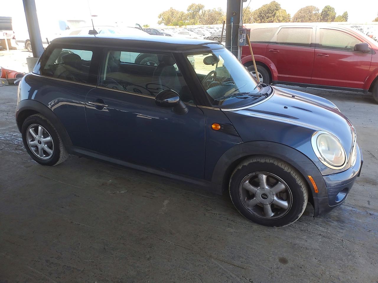 2010 Mini Cooper Blue vin: WMWMF3C51ATZ66394