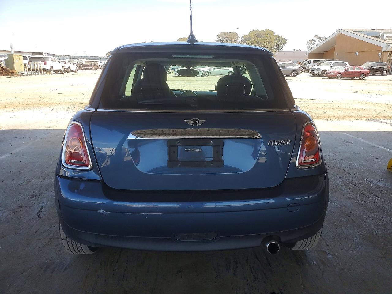 2010 Mini Cooper Blue vin: WMWMF3C51ATZ66394