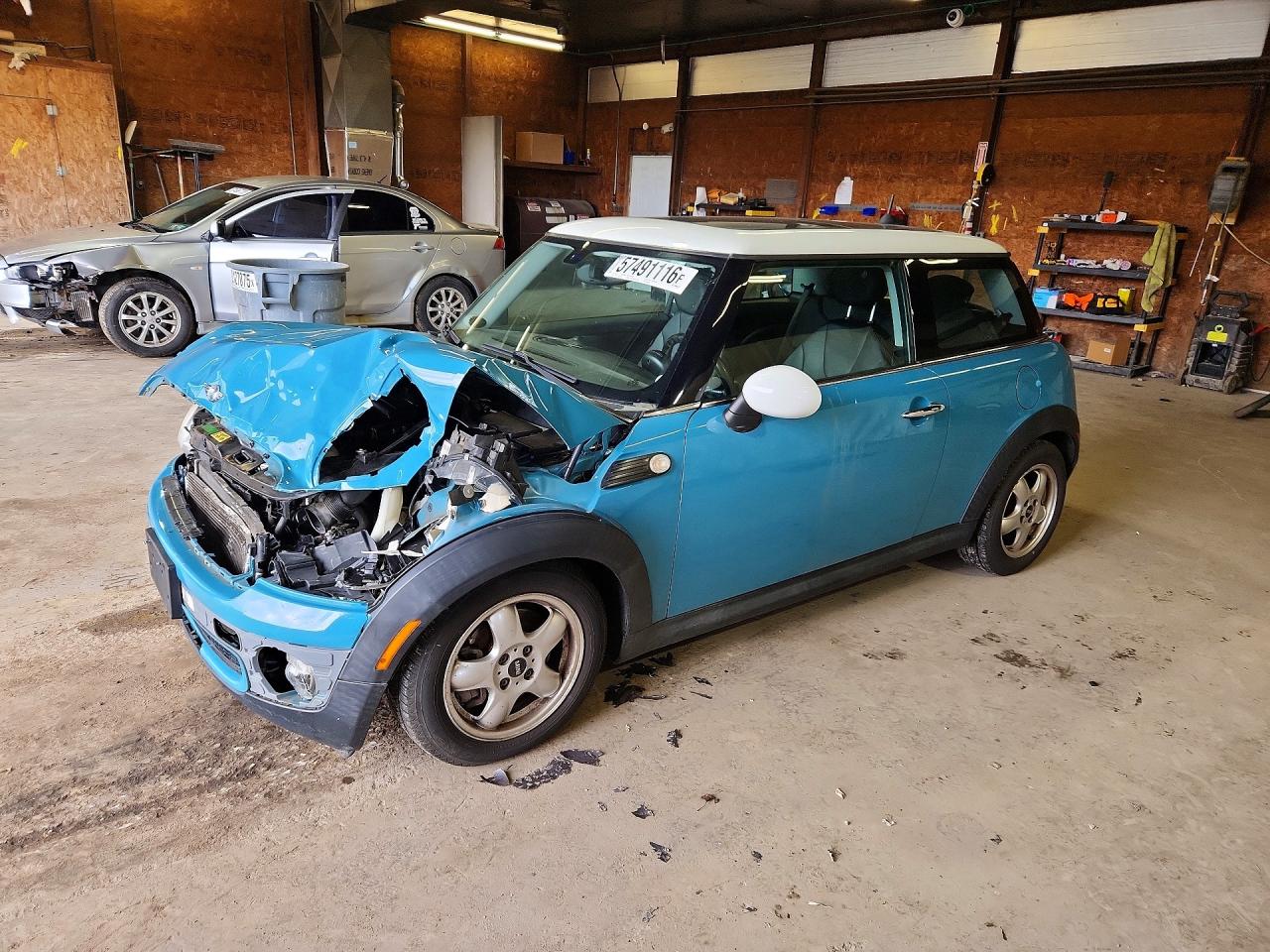 2010 Mini Cooper Blue vin: WMWMF3C52ATZ23070
