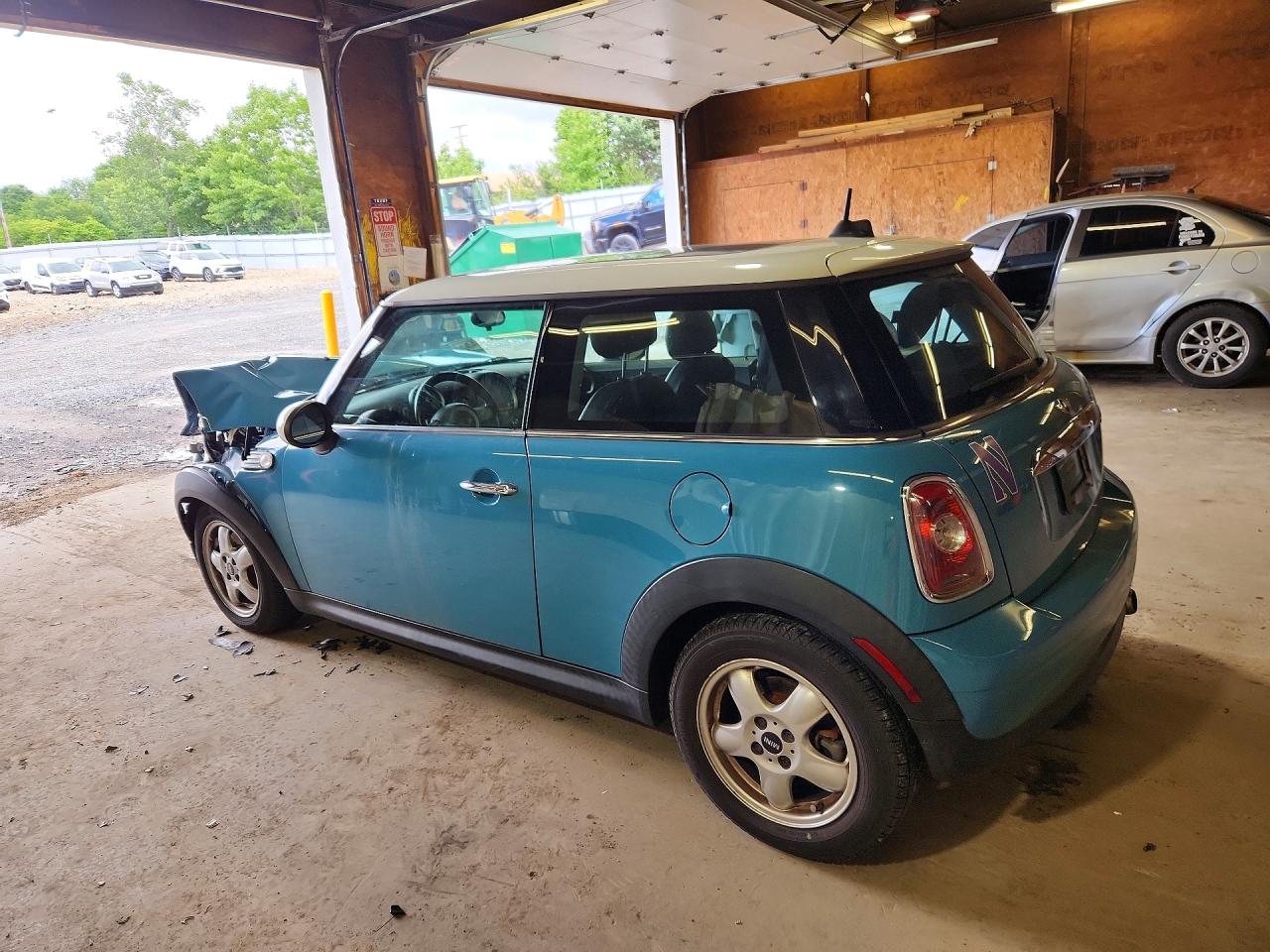 2010 Mini Cooper Blue vin: WMWMF3C52ATZ23070