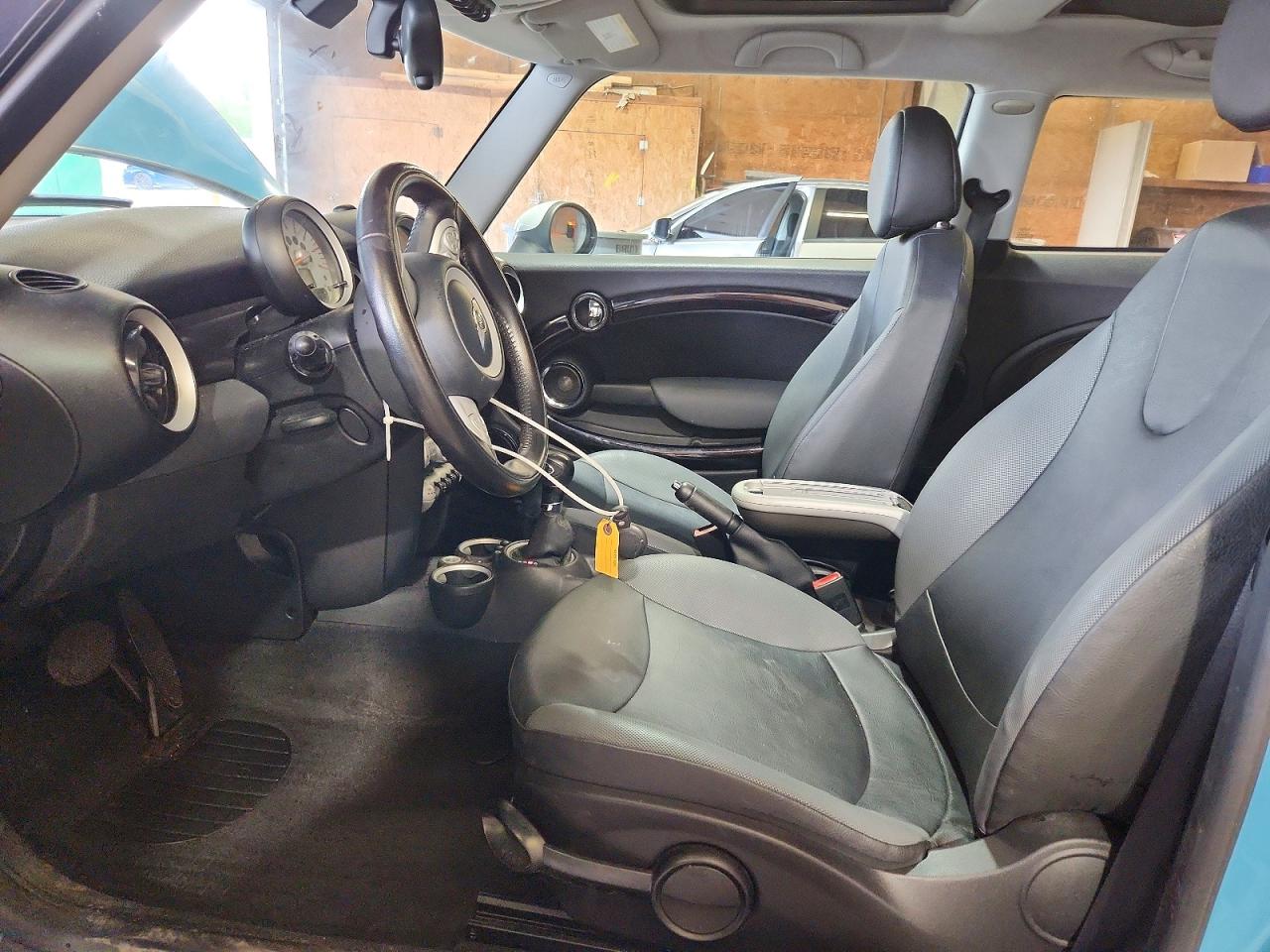 2010 Mini Cooper Blue vin: WMWMF3C52ATZ23070