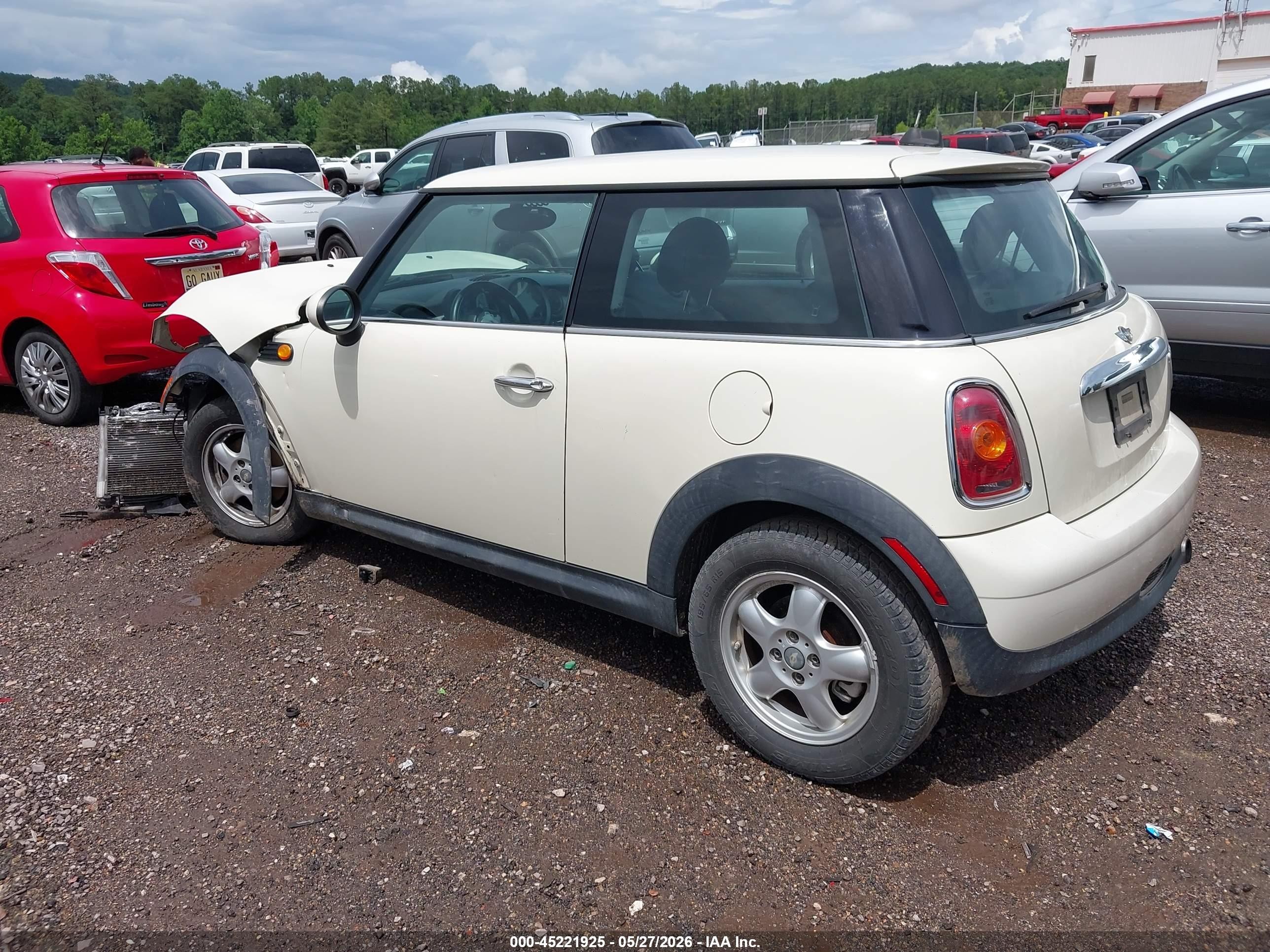 2010 Mini Cooper   White vin: WMWMF3C52ATZ27037