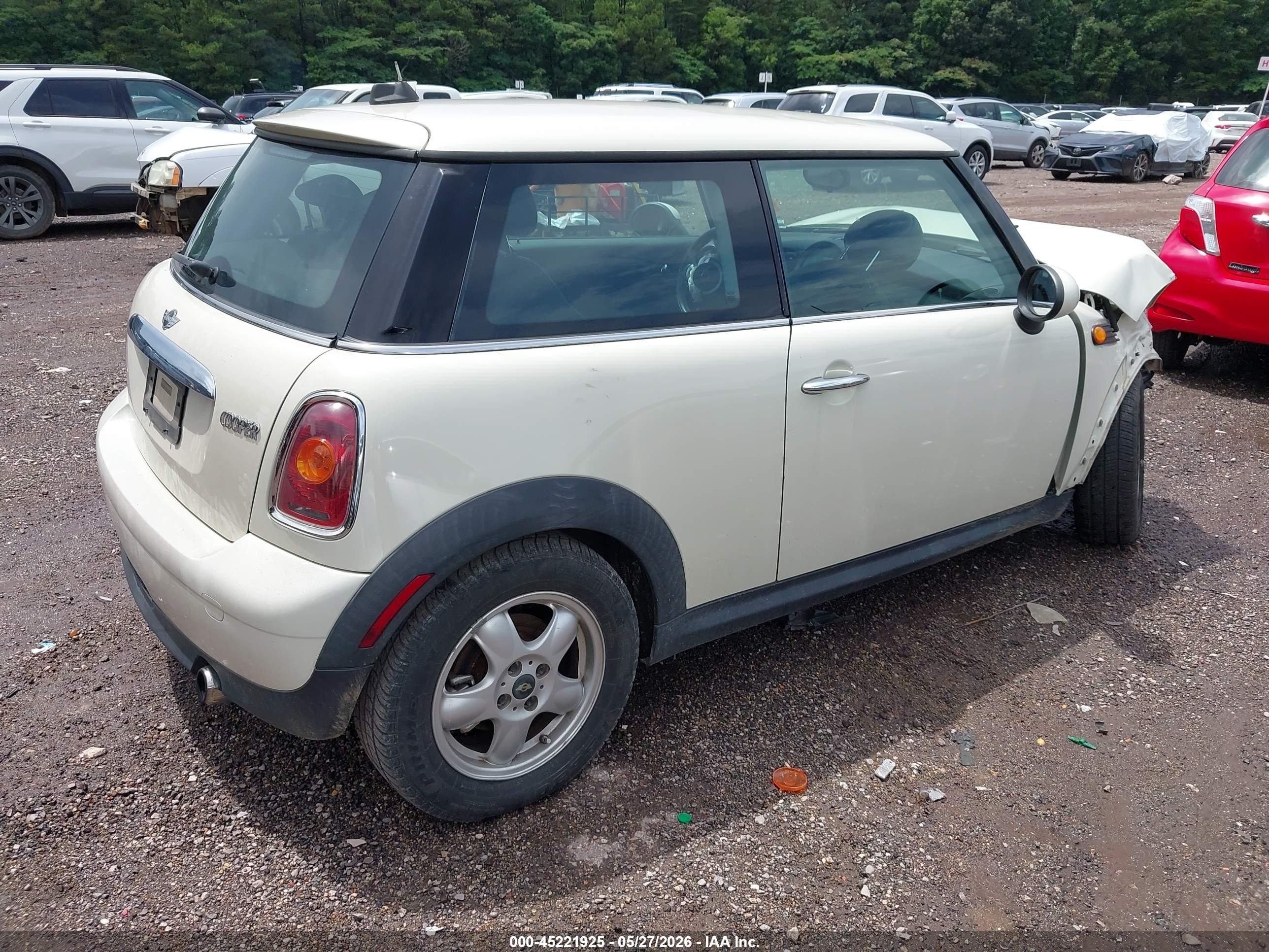 2010 Mini Cooper   White vin: WMWMF3C52ATZ27037