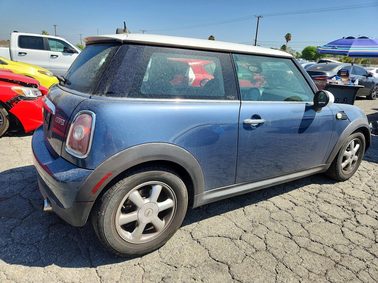 2010 Mini Cooper Blue vin: WMWMF3C52ATZ61544