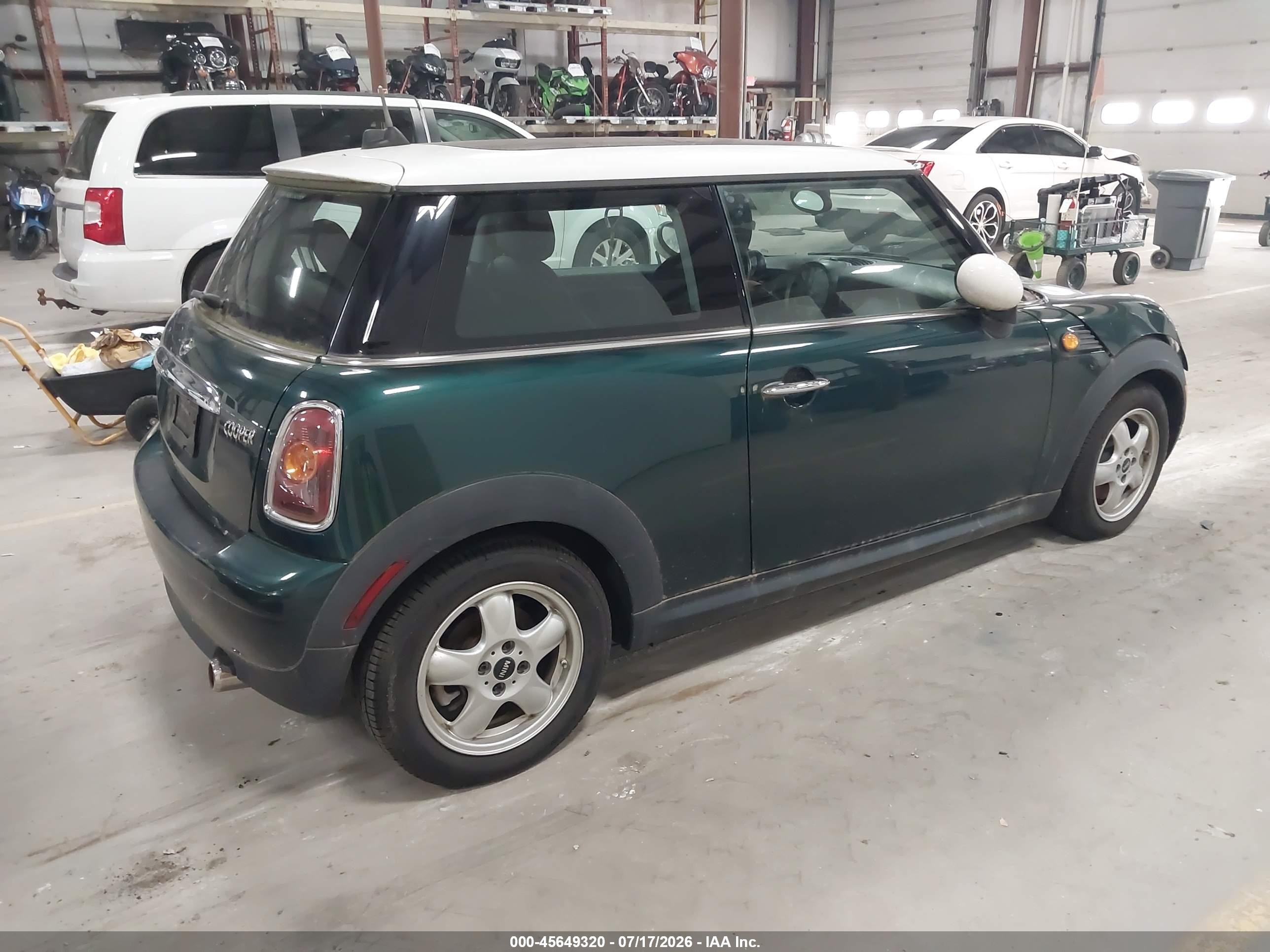 2010 Mini Cooper   Green vin: WMWMF3C52ATZ66551