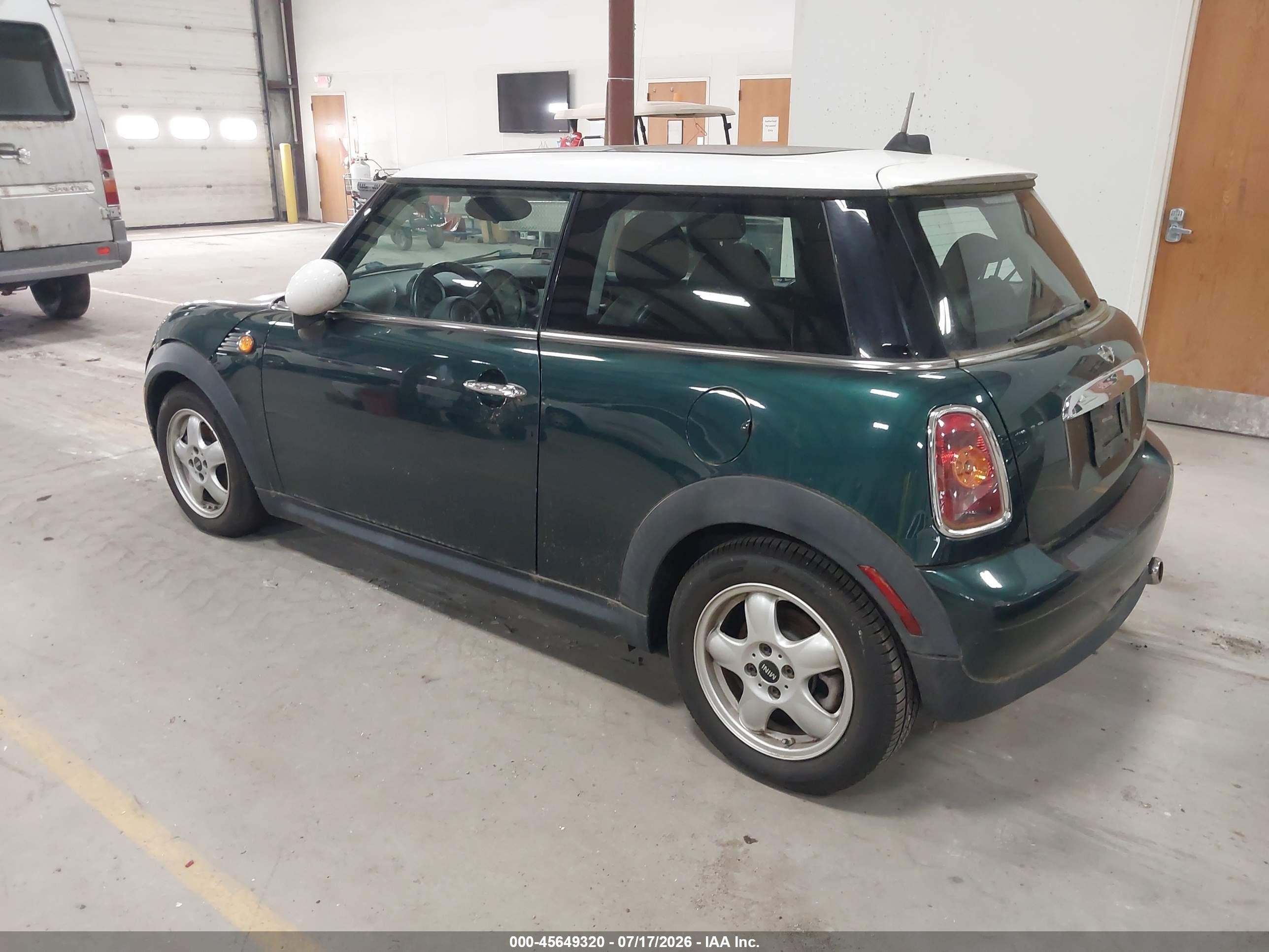2010 Mini Cooper   Green vin: WMWMF3C52ATZ66551