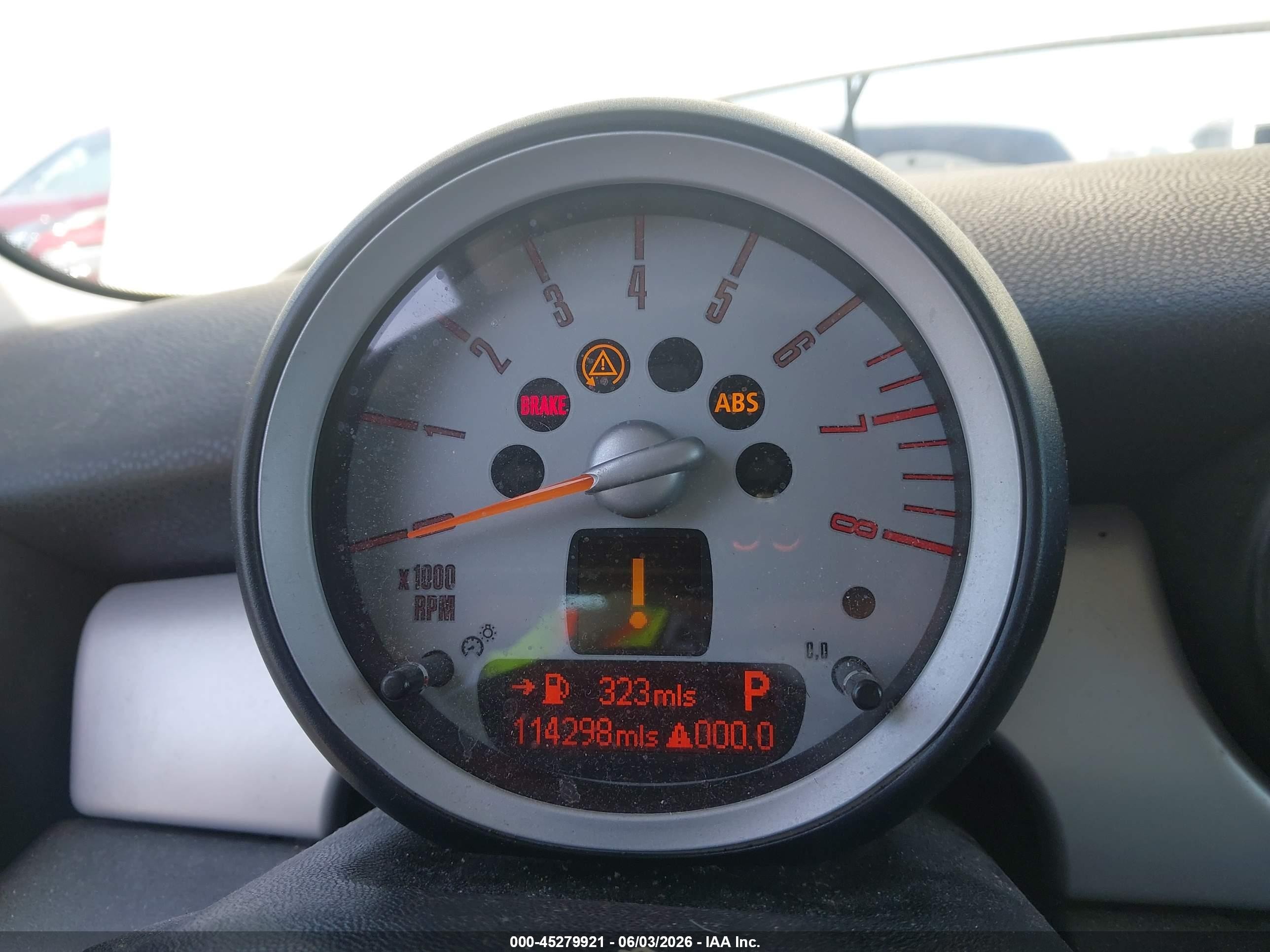 2010 Mini Cooper   Cream vin: WMWMF3C54ATZ65644