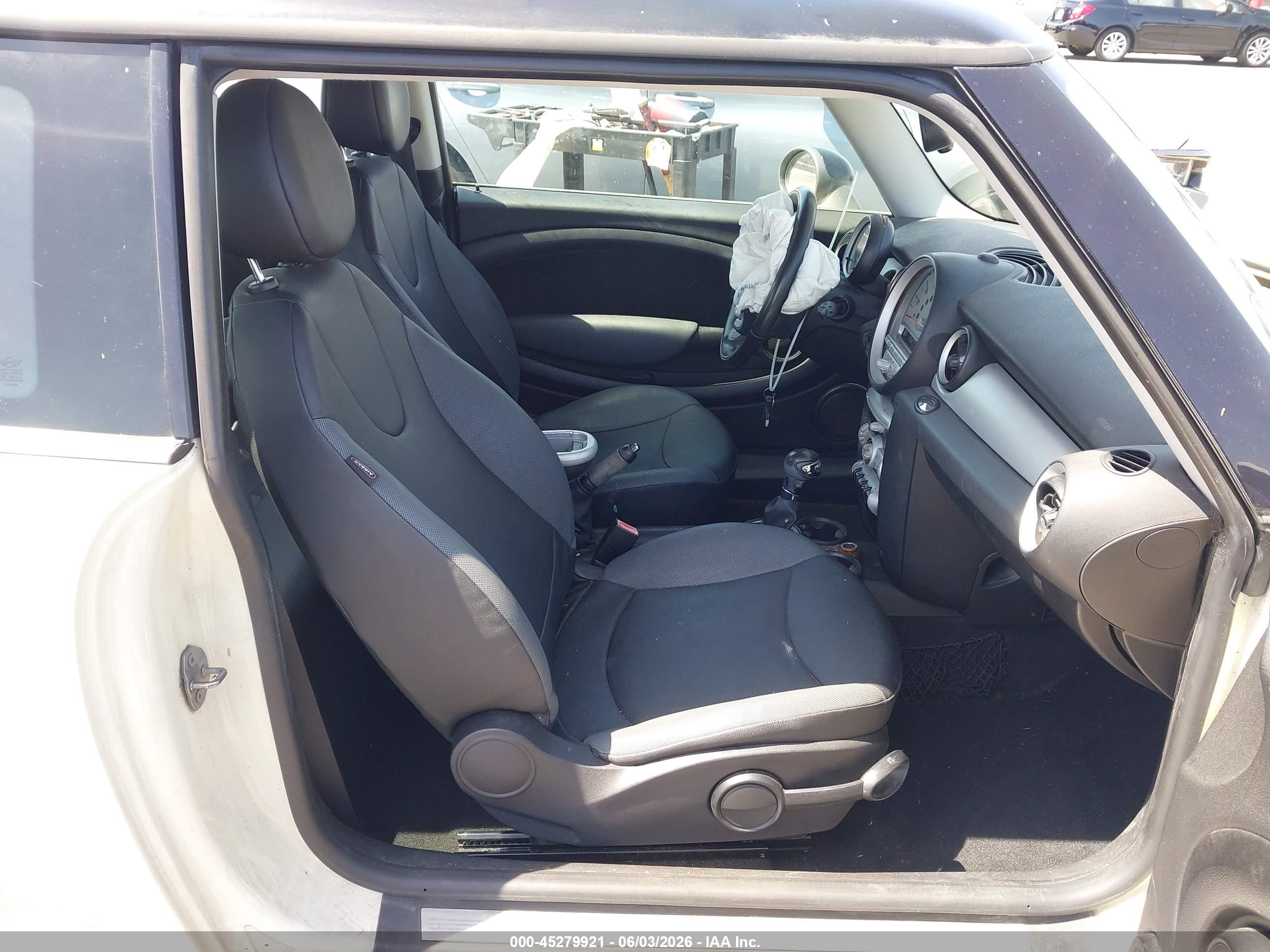 2010 Mini Cooper   Cream vin: WMWMF3C54ATZ65644