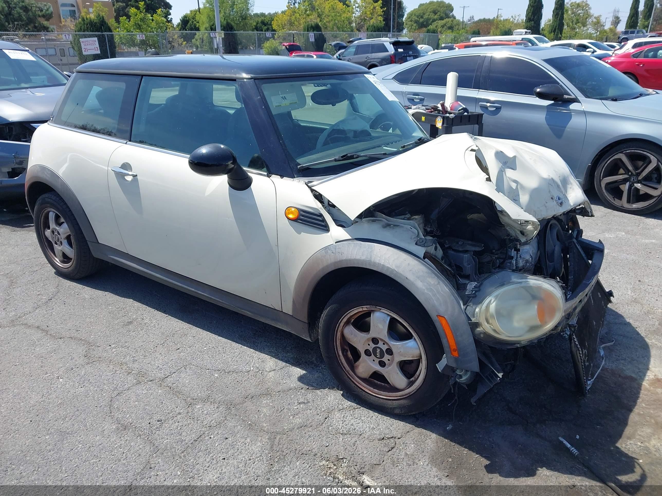 2010 Mini Cooper   Cream vin: WMWMF3C54ATZ65644