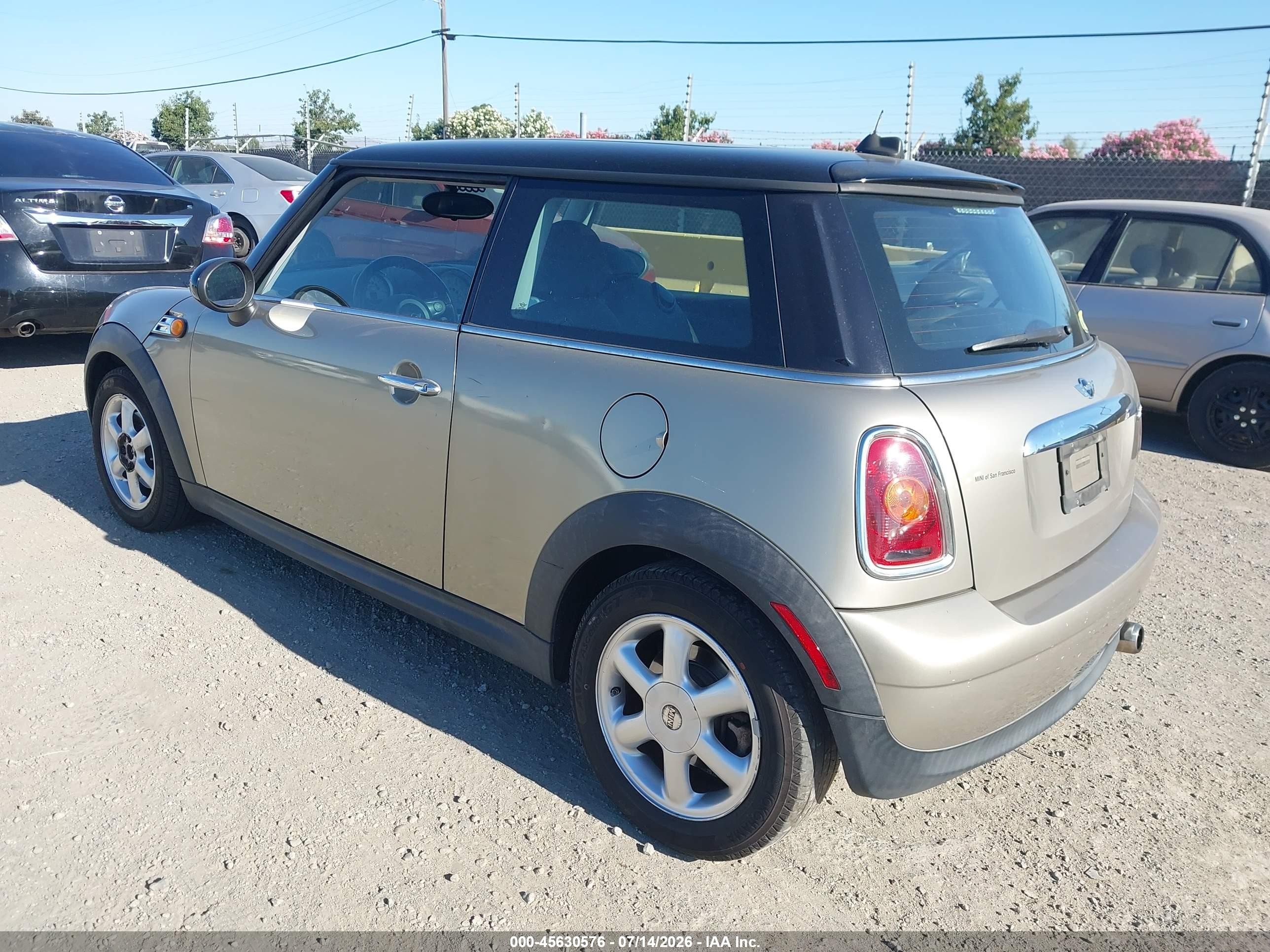 2010 Mini Cooper   Gray vin: WMWMF3C58ATZ26796