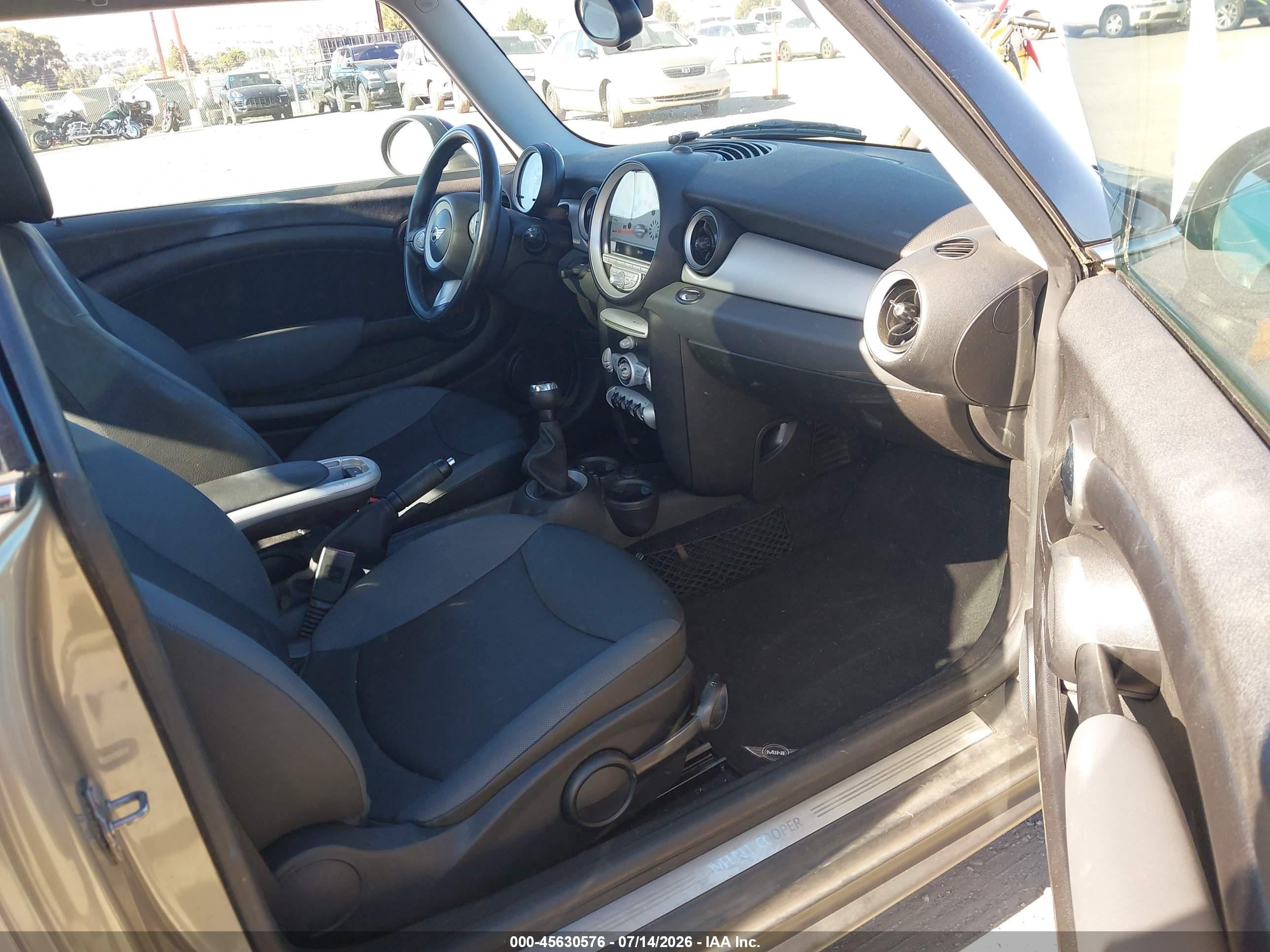 2010 Mini Cooper   Gray vin: WMWMF3C58ATZ26796