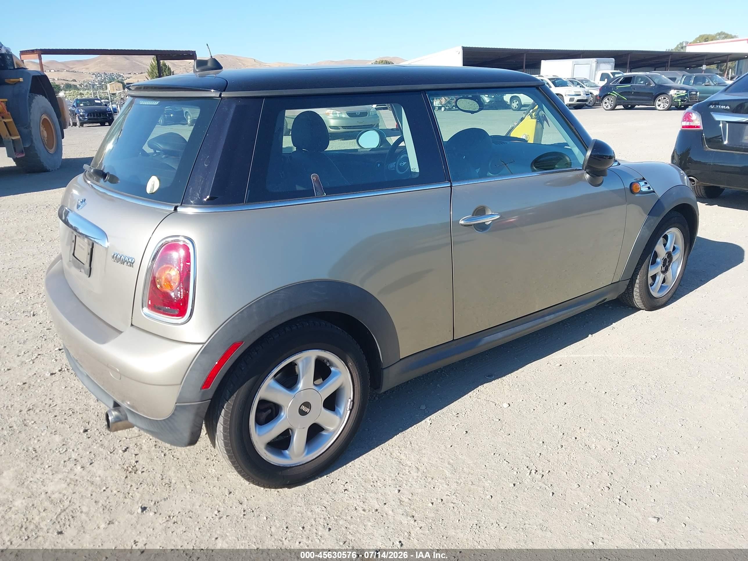 2010 Mini Cooper   Gray vin: WMWMF3C58ATZ26796