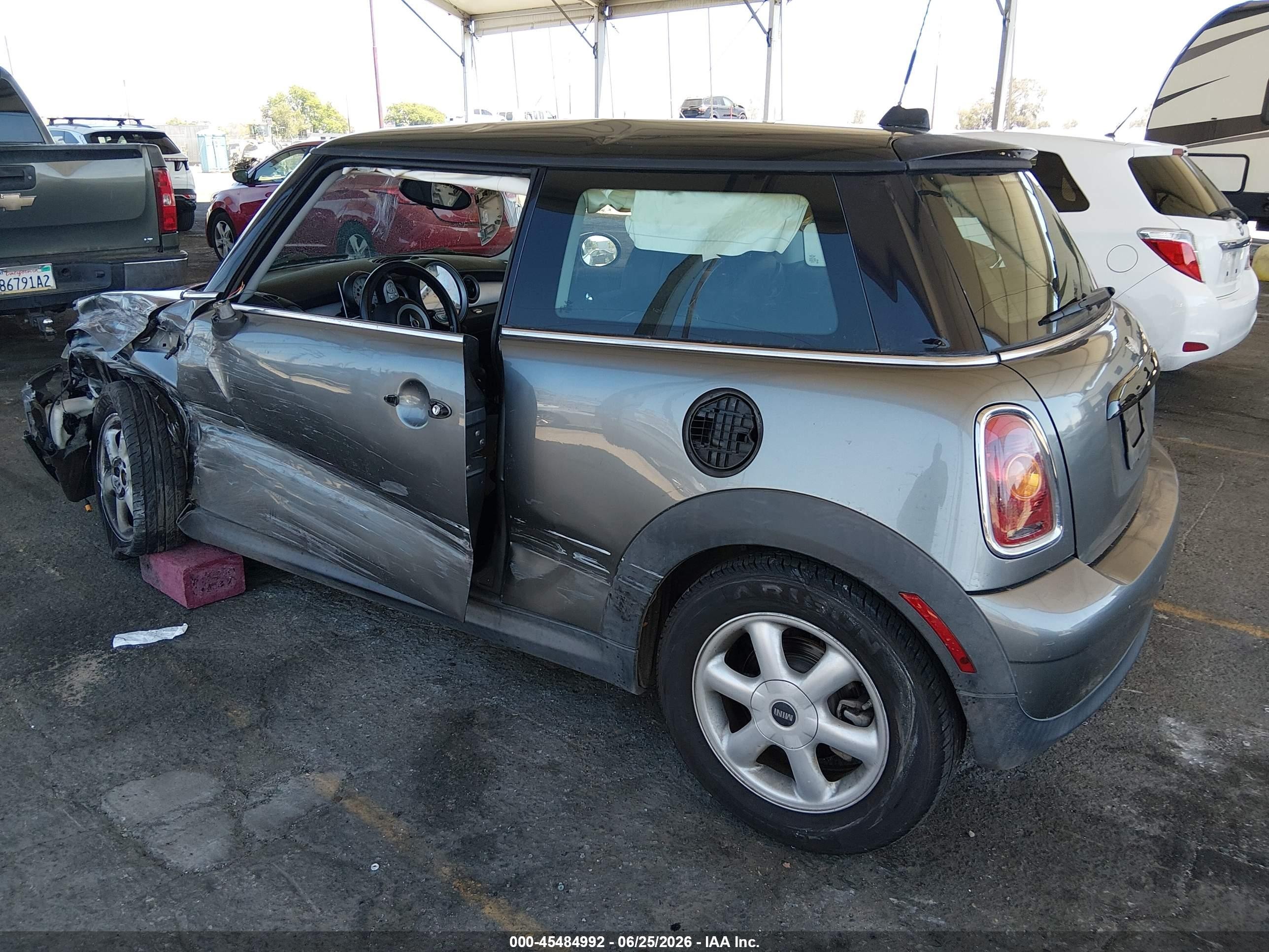 2010 Mini Cooper   Gray vin: WMWMF3C5XATZ24726
