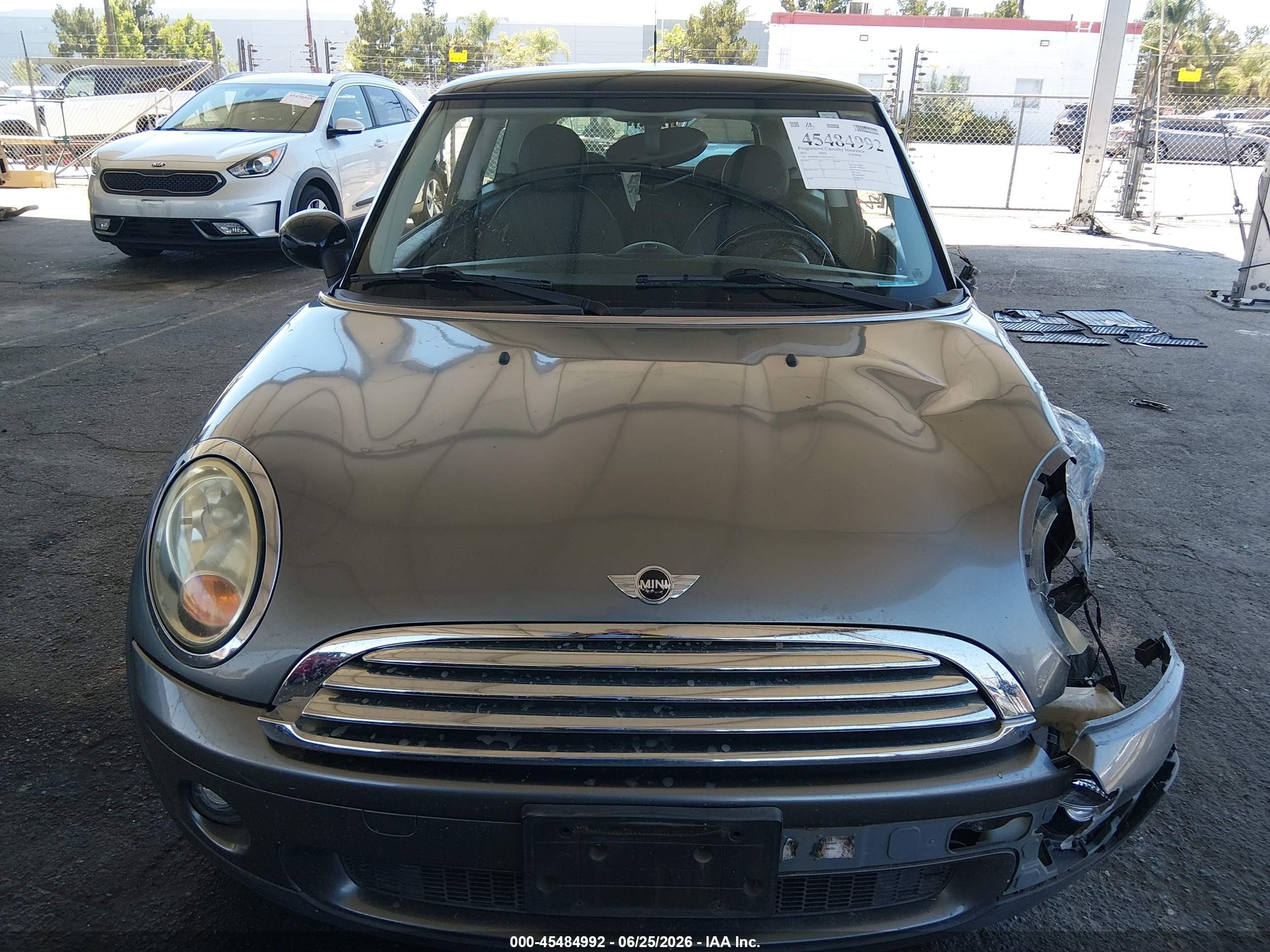 2010 Mini Cooper   Gray vin: WMWMF3C5XATZ24726