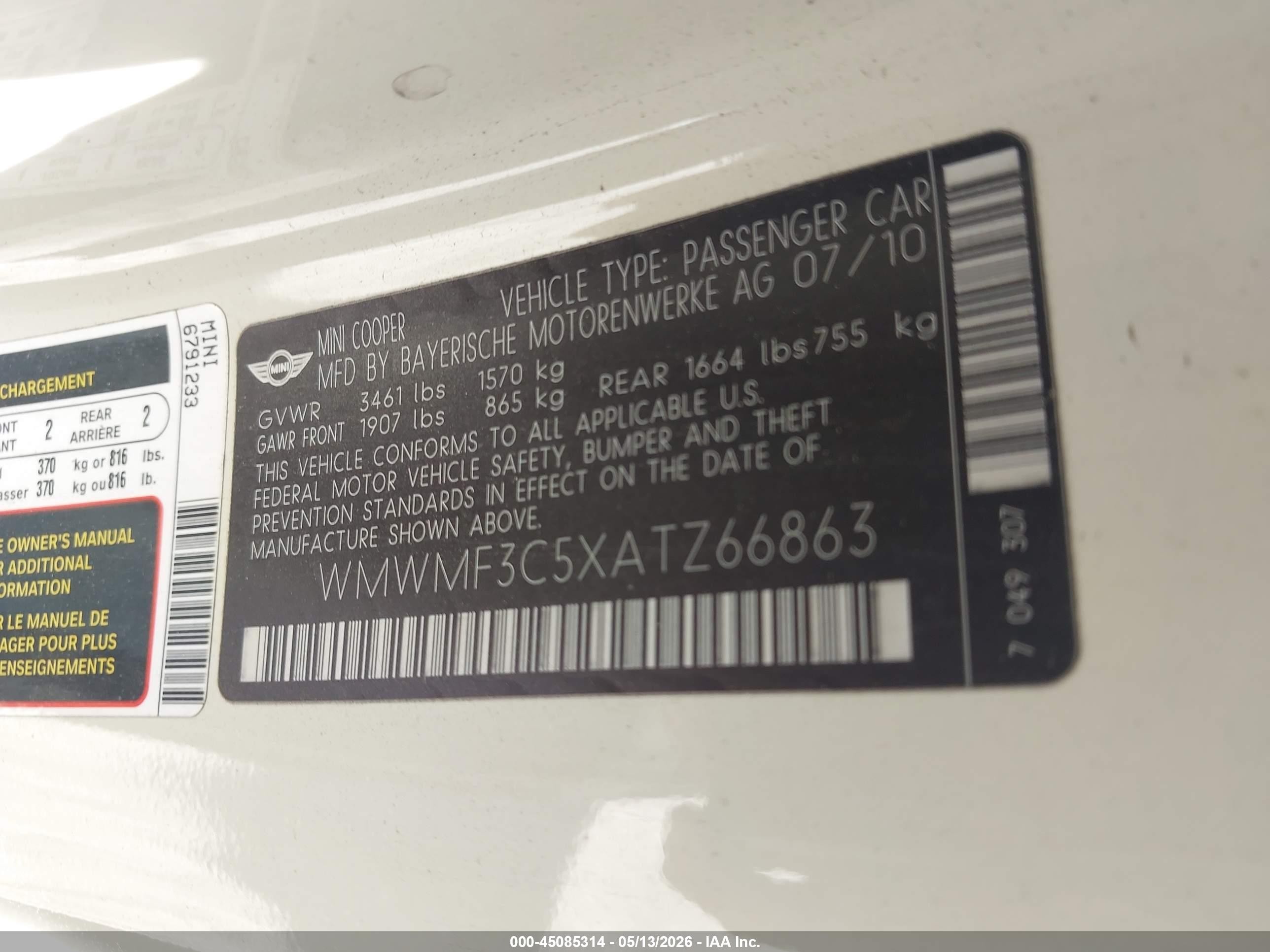 2010 Mini Cooper   White vin: WMWMF3C5XATZ66863