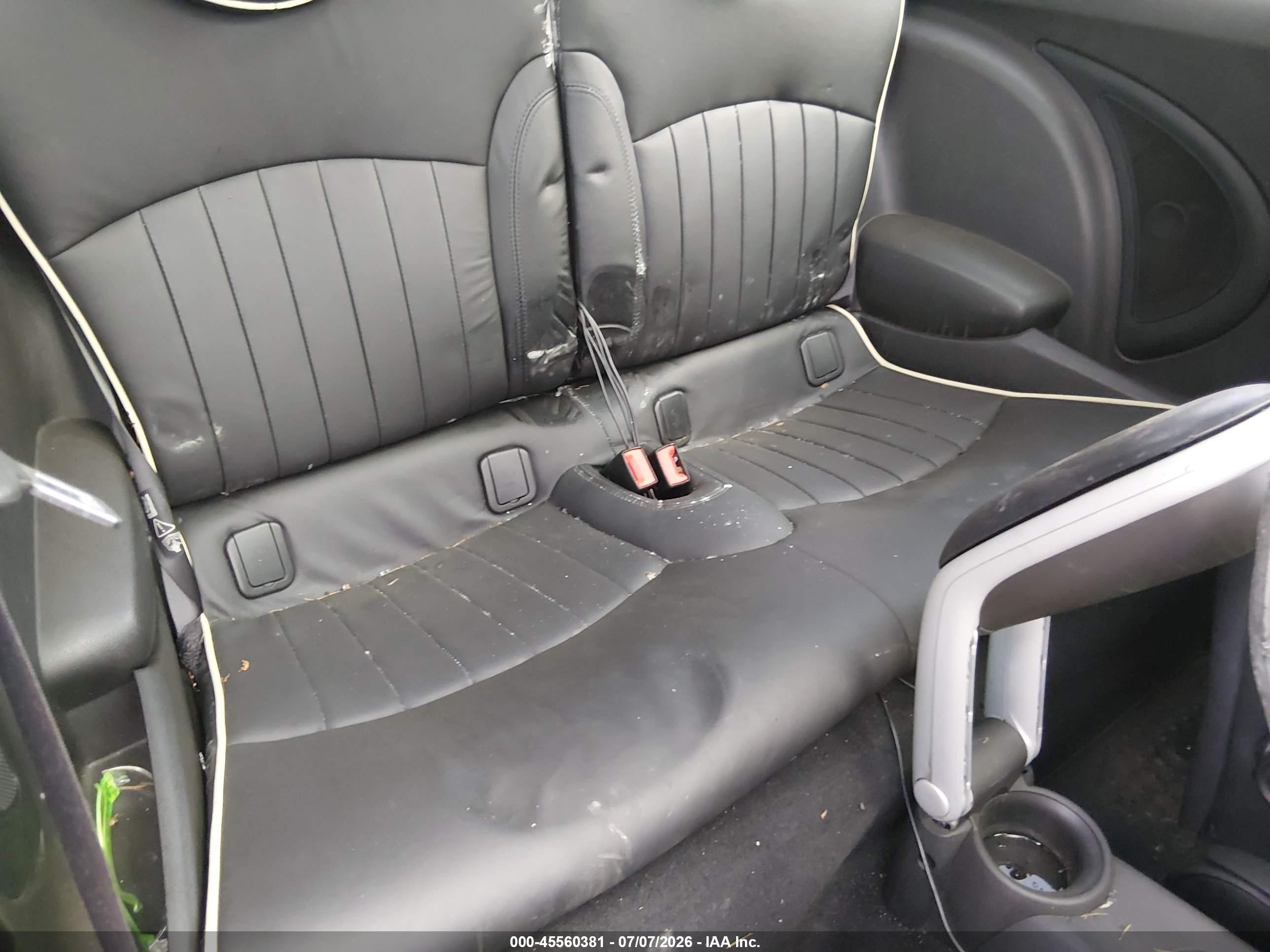 2009 Mini Cooper S   Black vin: WMWMF73509TT95015