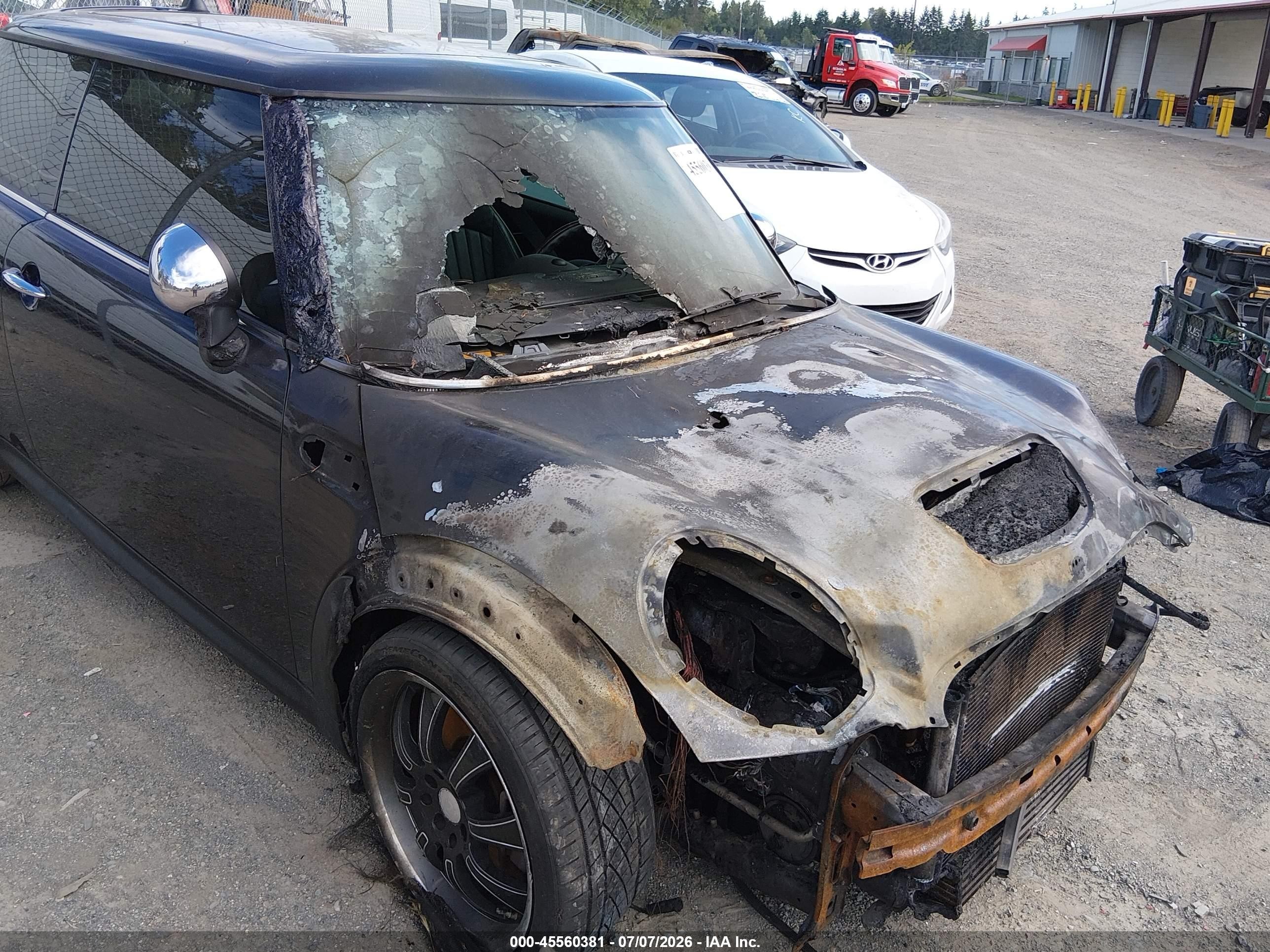 2009 Mini Cooper S   Black vin: WMWMF73509TT95015