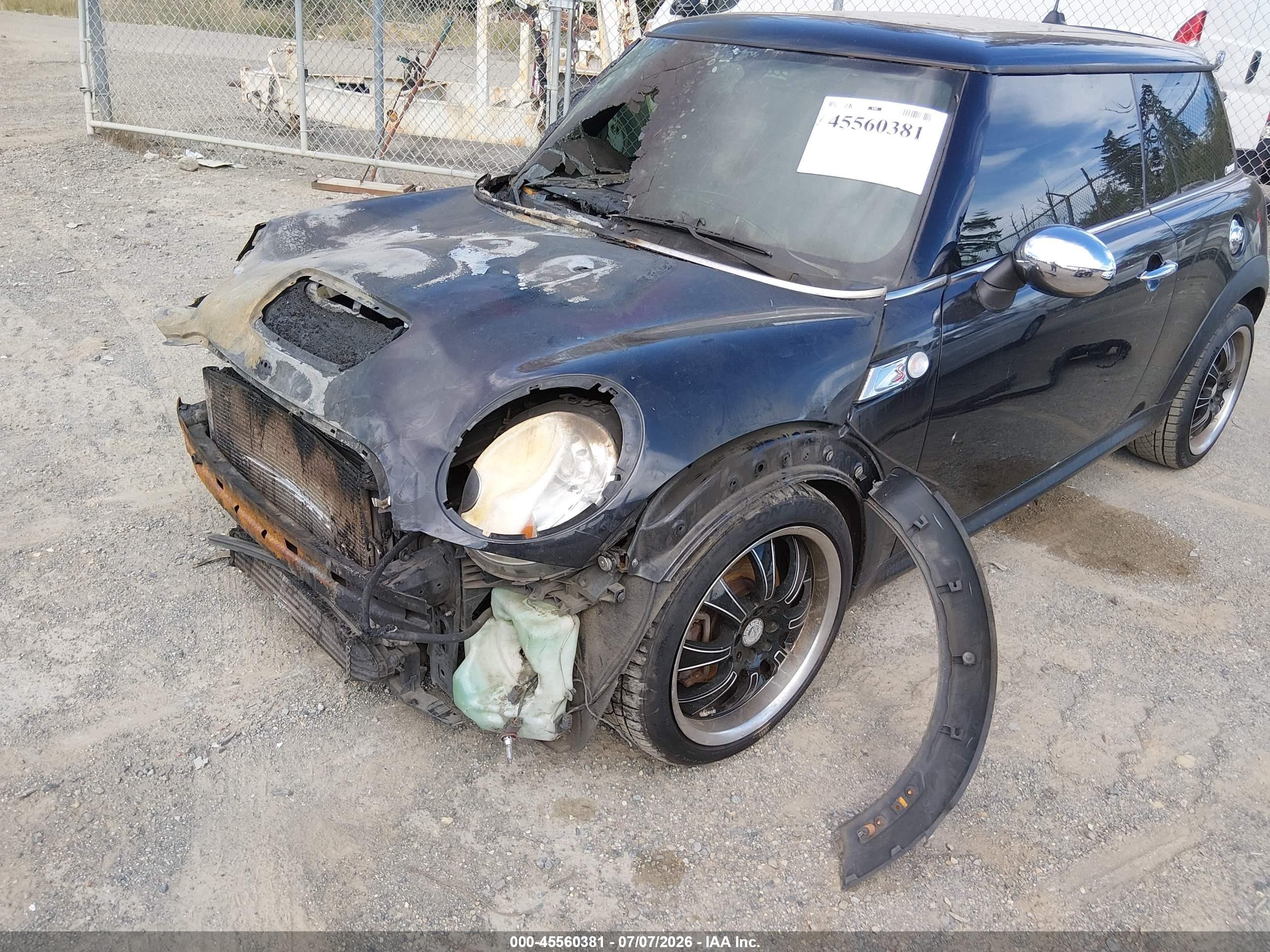 2009 Mini Cooper S   Black vin: WMWMF73509TT95015