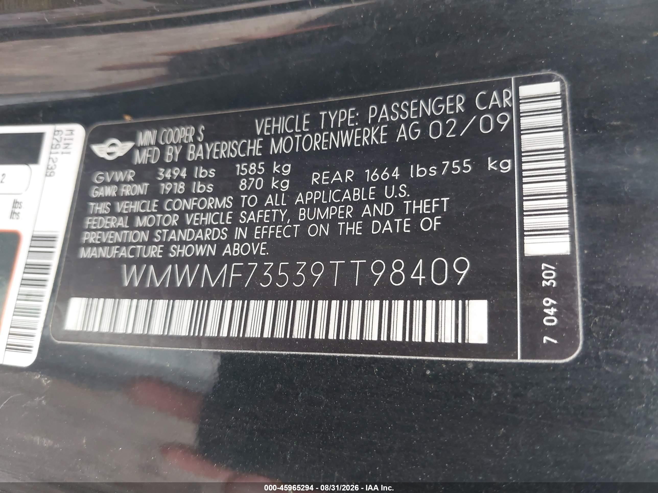 2009 Mini Cooper S   Black vin: WMWMF73539TT98409
